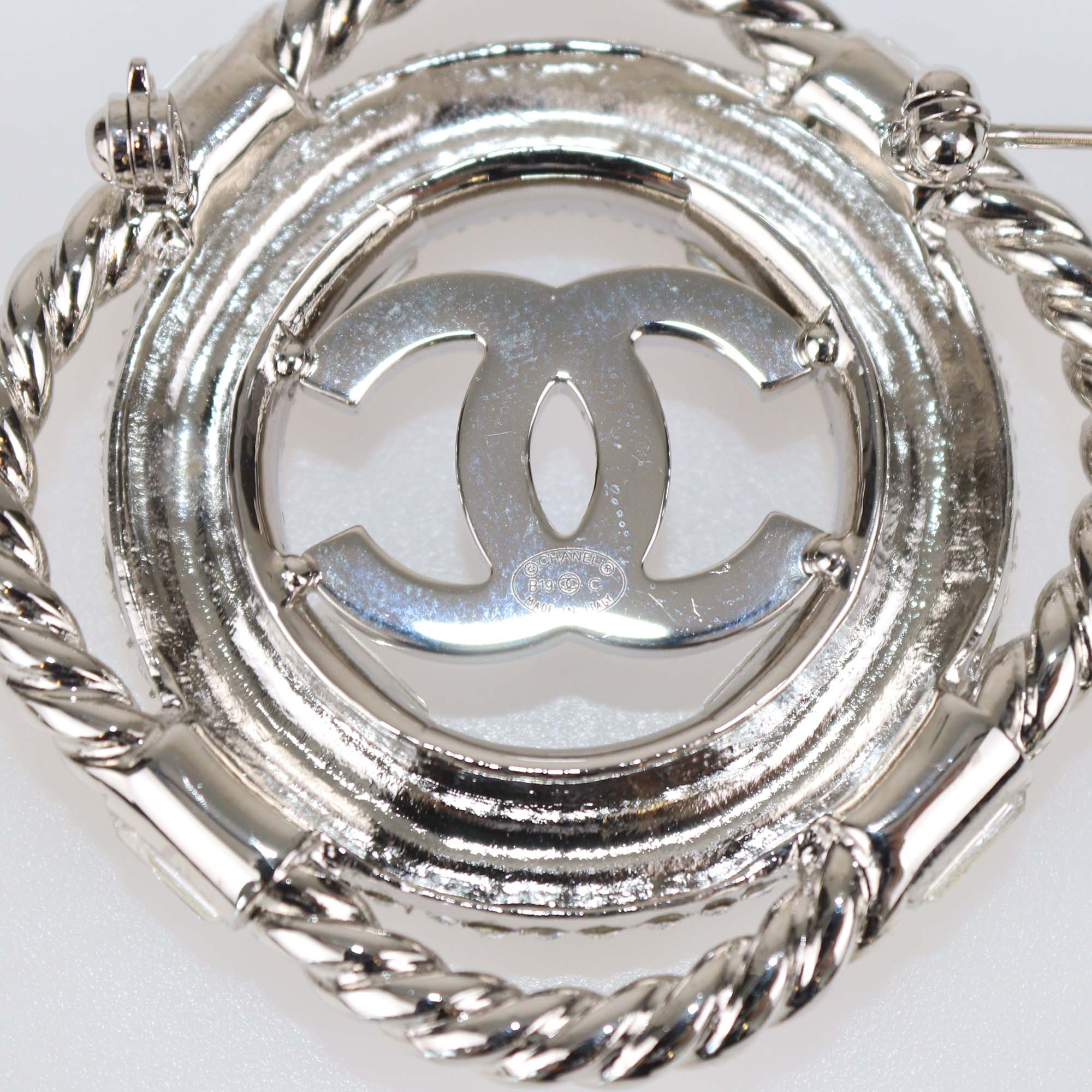 Chanel Silver Tone Metal/Blue Crystal CC Lifesaver Brooch