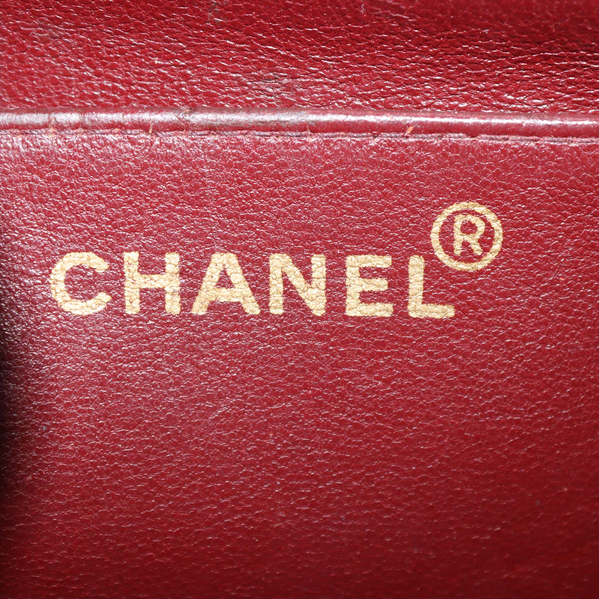 Chanel Black Vertical Quilt Leather Mademoiselle Flap Bag