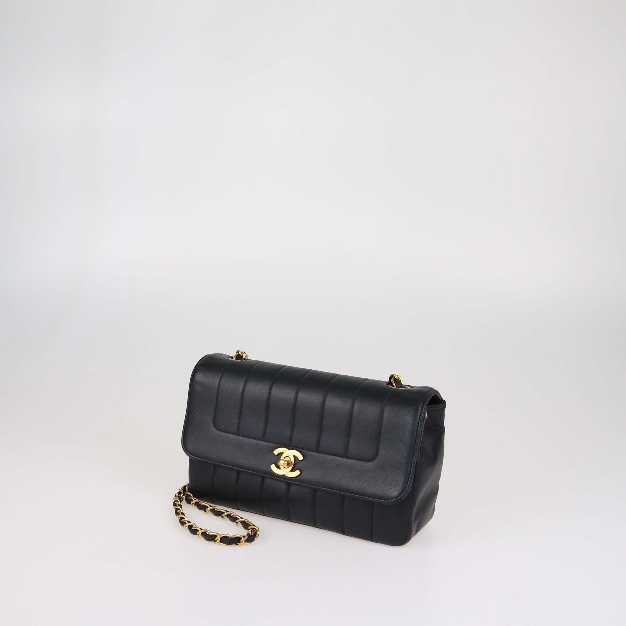 Chanel Black Vertical Quilt Leather Mademoiselle Flap Bag