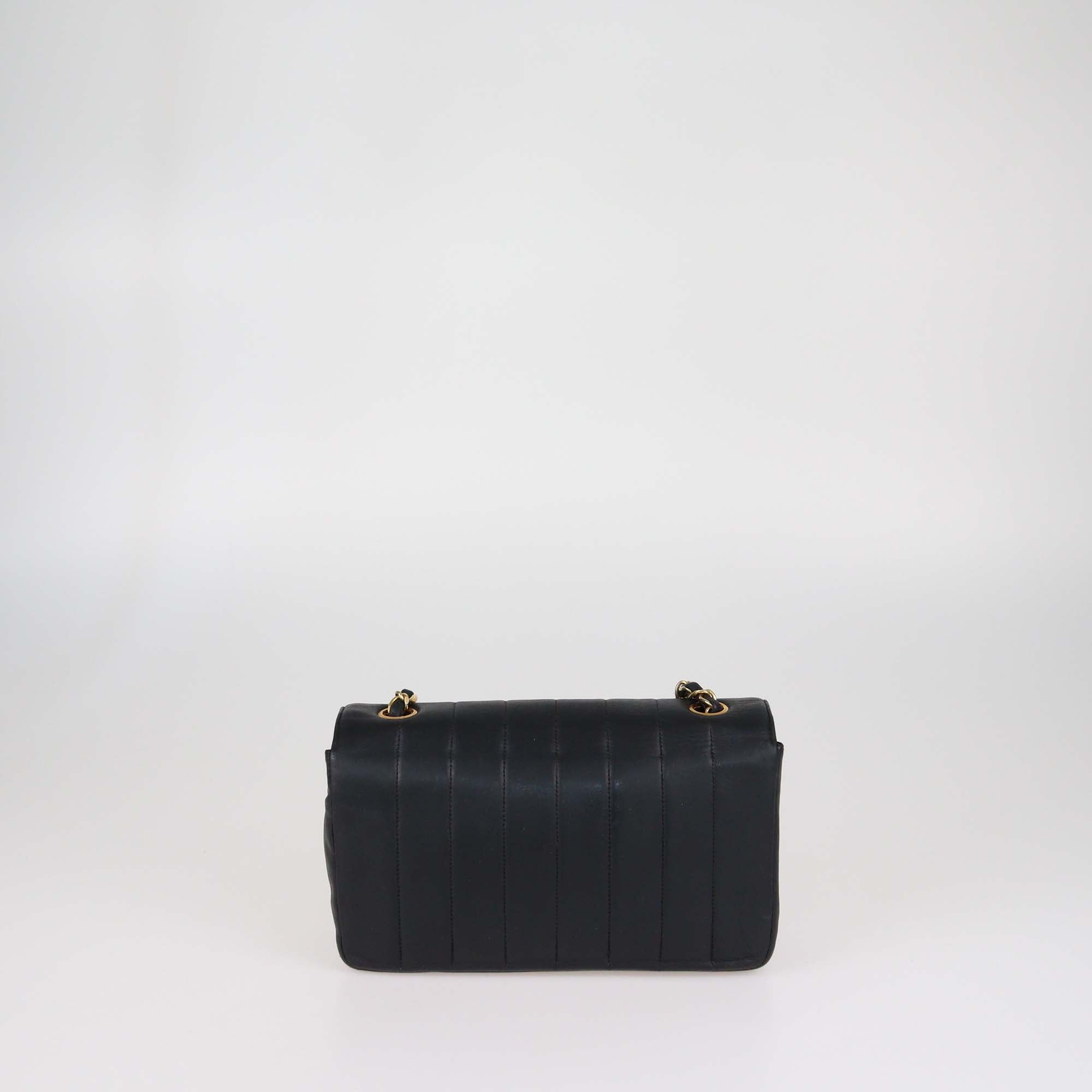 Chanel Black Vertical Quilt Leather Mademoiselle Flap Bag