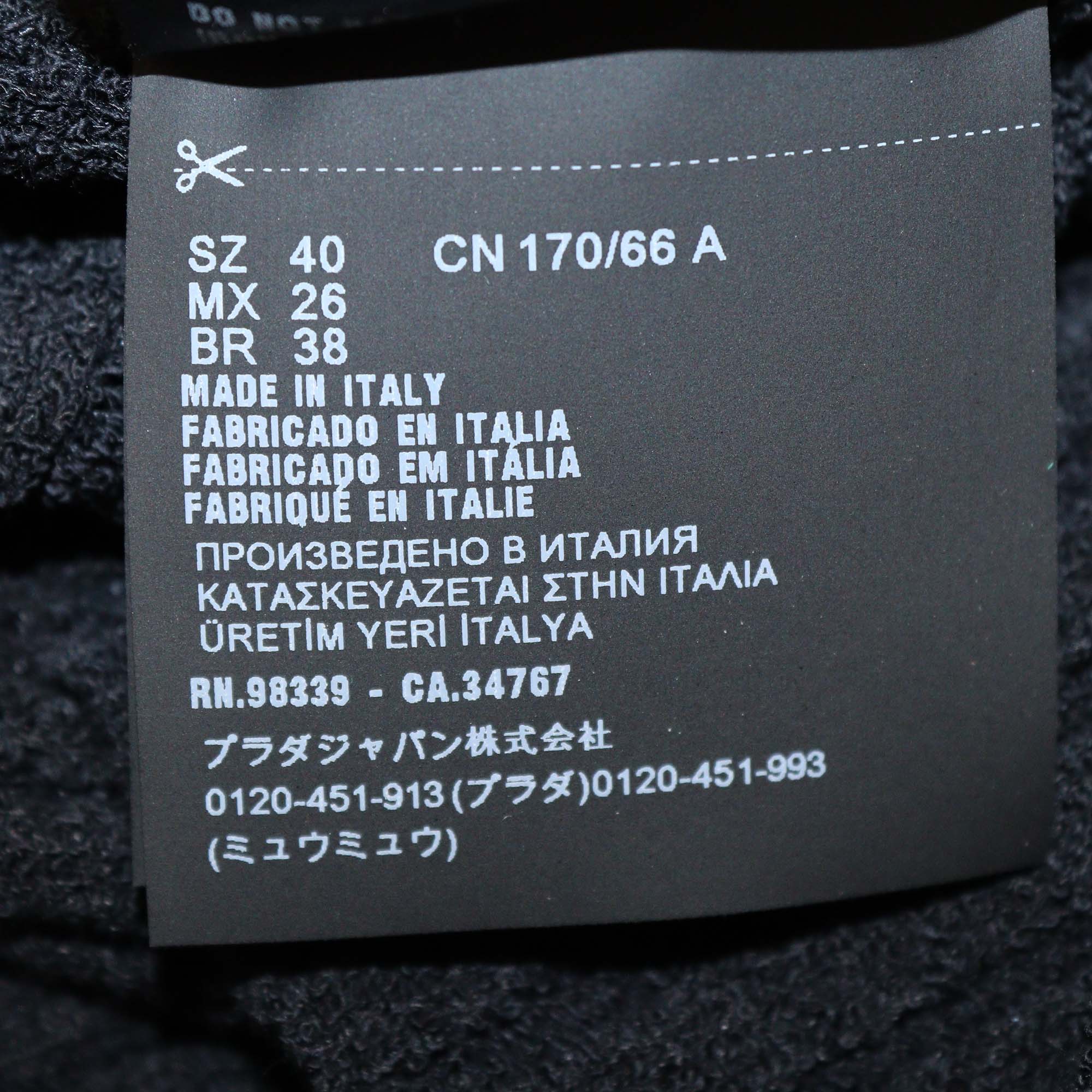 Prada Cotton Blended Knit Logo Embroidered Ribbed Midi Skirt