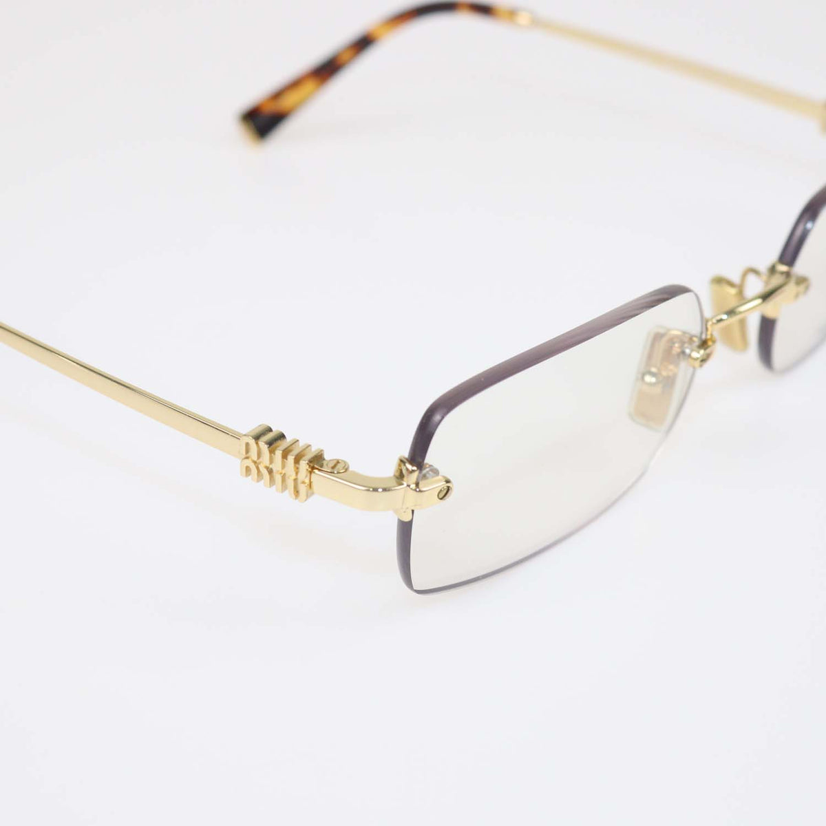 Miu Miu Gold, Blue-ray Transparent Lens Frameless Glasses