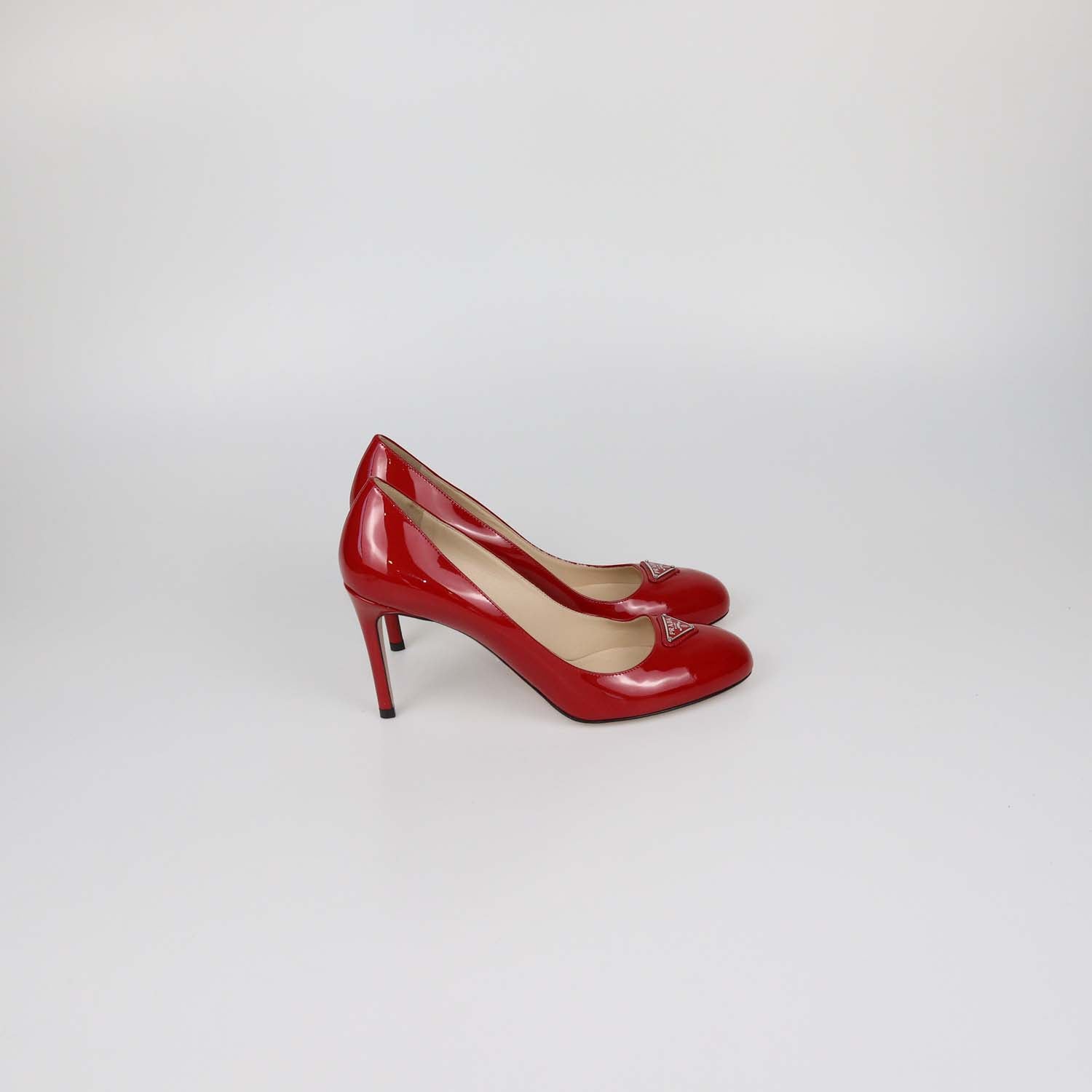 Prada Red Patent Leather Plaque Round Toe Pumps