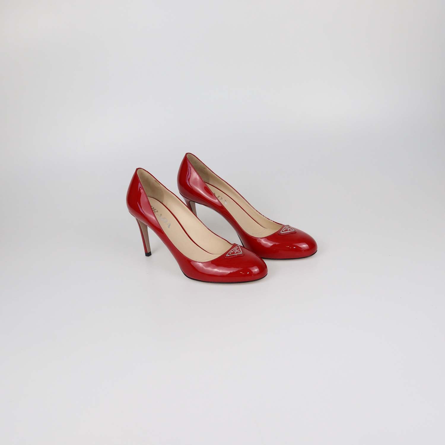 Prada Red Patent Leather Plaque Round Toe Pumps