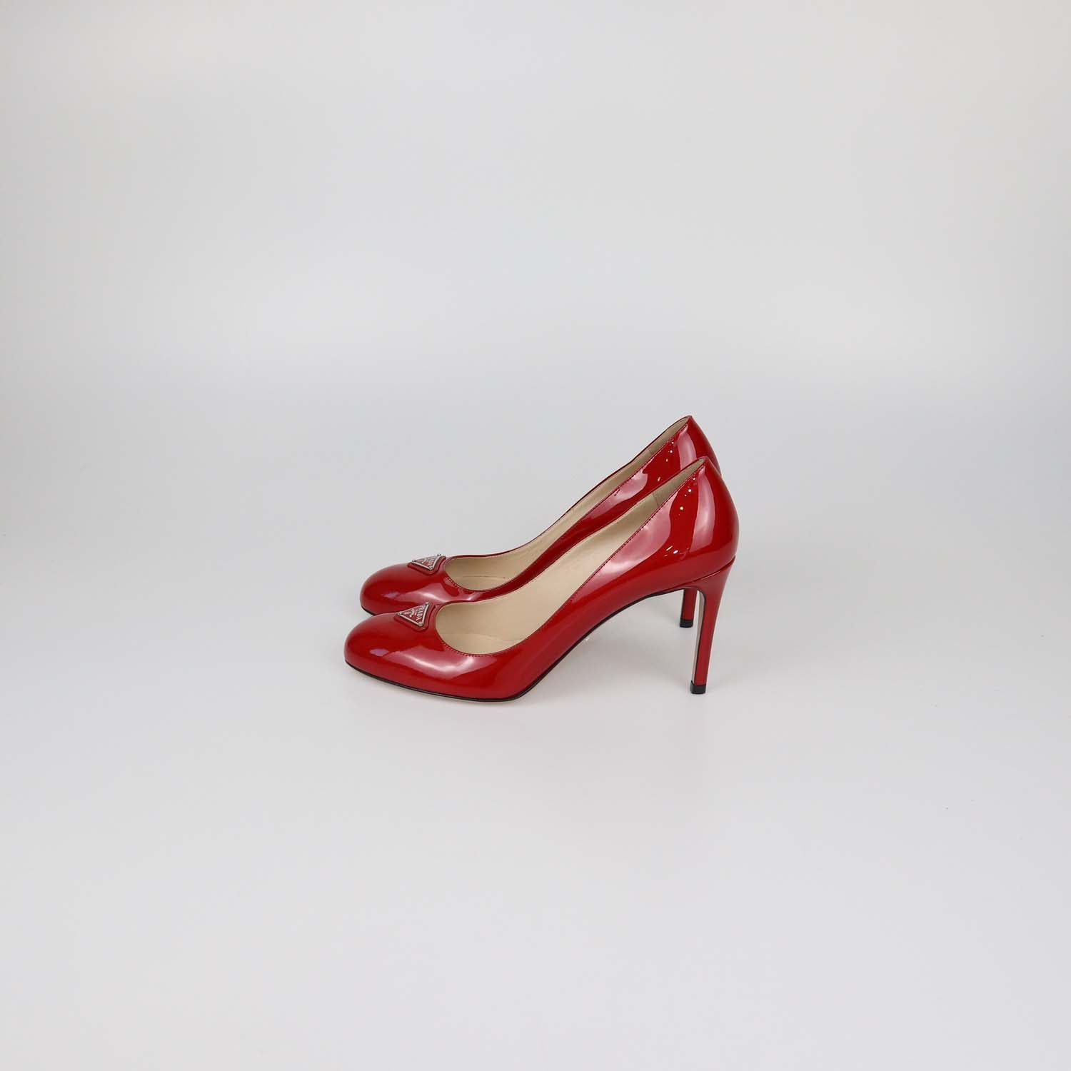 Prada Red Patent Leather Plaque Round Toe Pumps