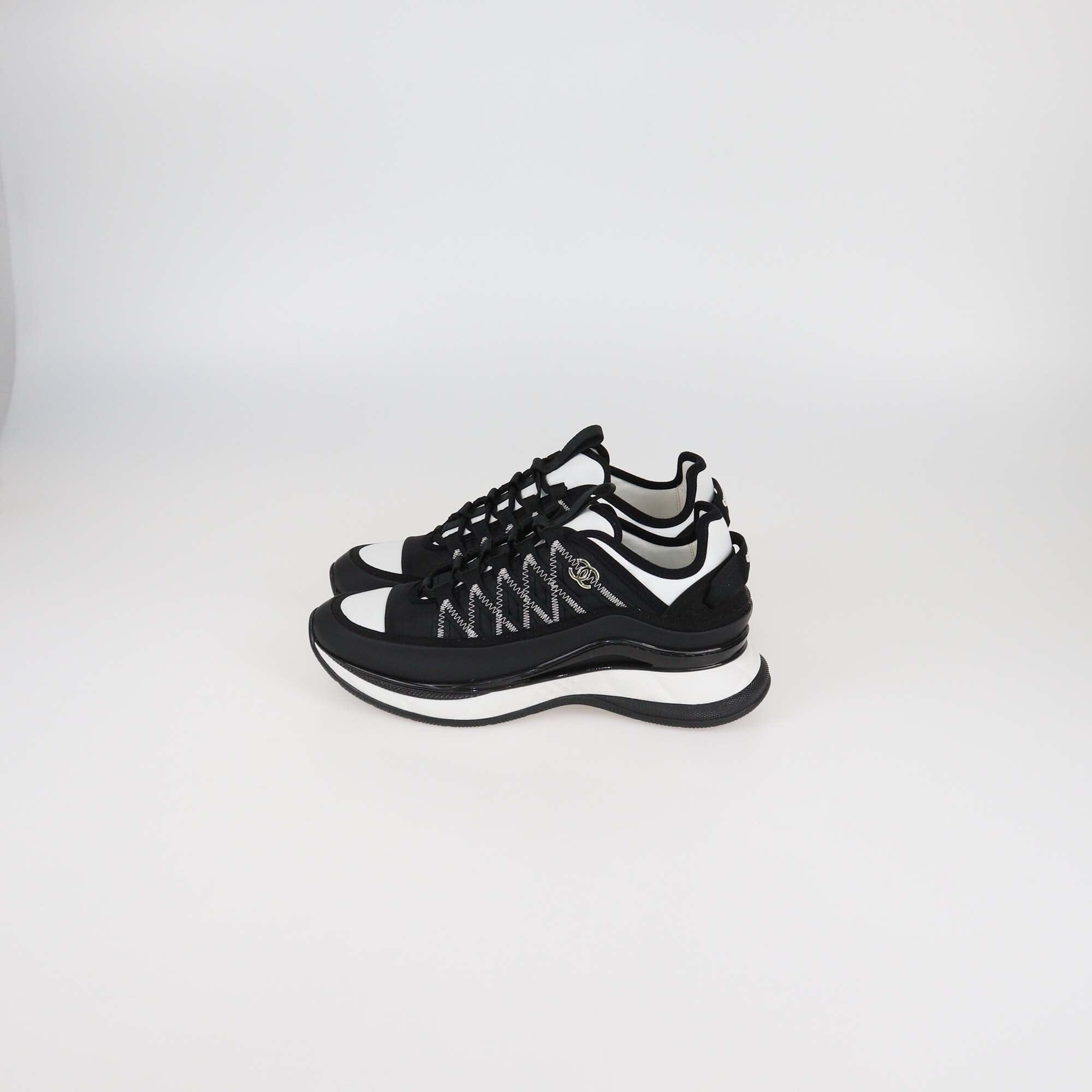 Chanel Black/White Leather and Fabric CC Low Top Sneakers Womens Chanel
