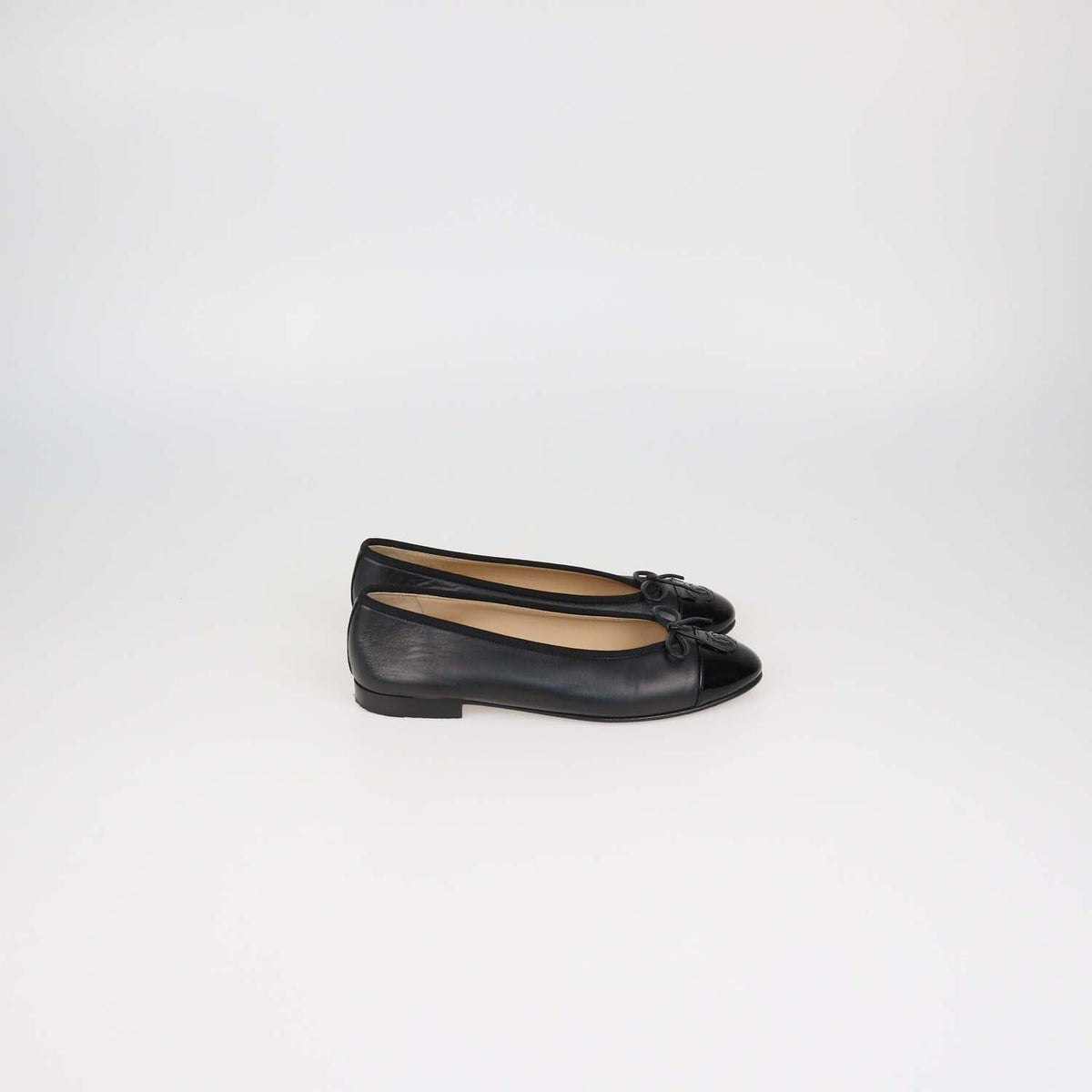Chanel Black Leather and Patent Leather CC Cap Toe Flats