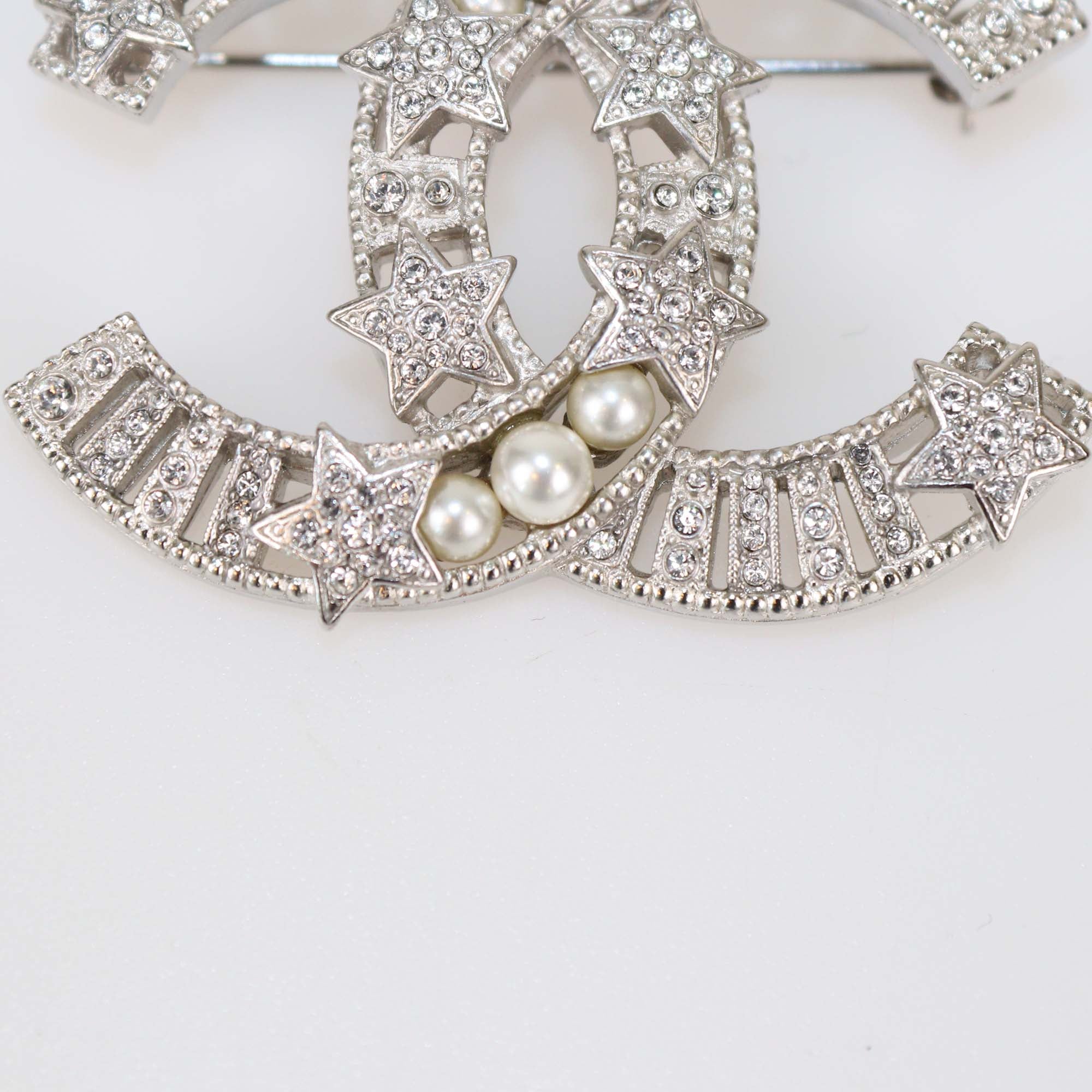 Chanel Silver Tone Metal Crystal Star and Faux Pearl CC Brooch