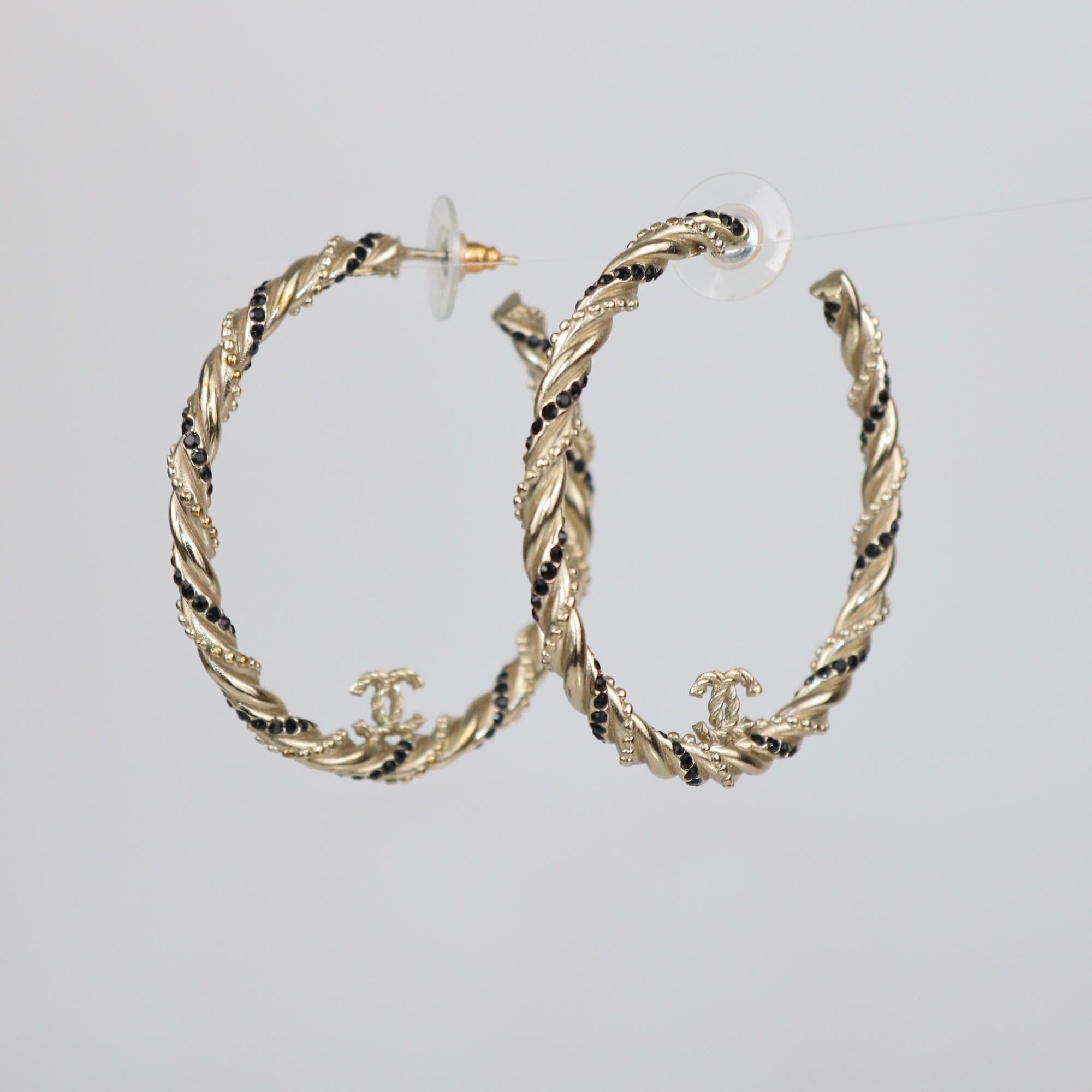 Chanel Gold Tone Metal Rhinestone CC Twisted Hoop Earrings Womens Chanel