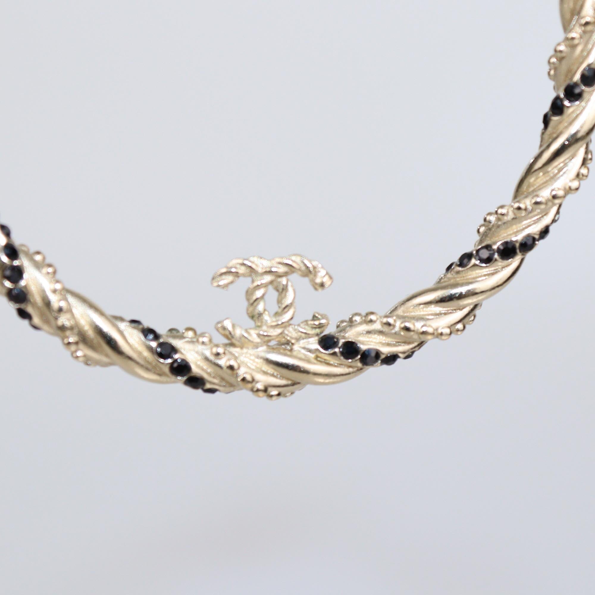 Chanel Gold Tone Metal Rhinestone CC Twisted Hoop Earrings Womens Chanel