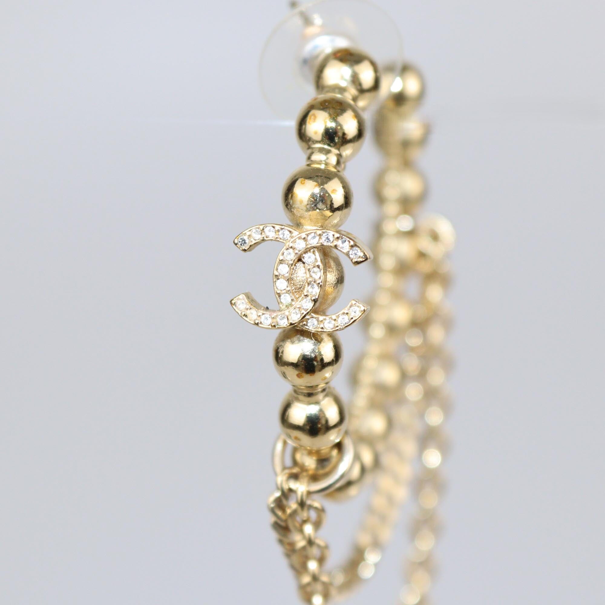 Chanel Gold Tone Metal Crystal CC Chain Hoop Earrings Womens Chanel