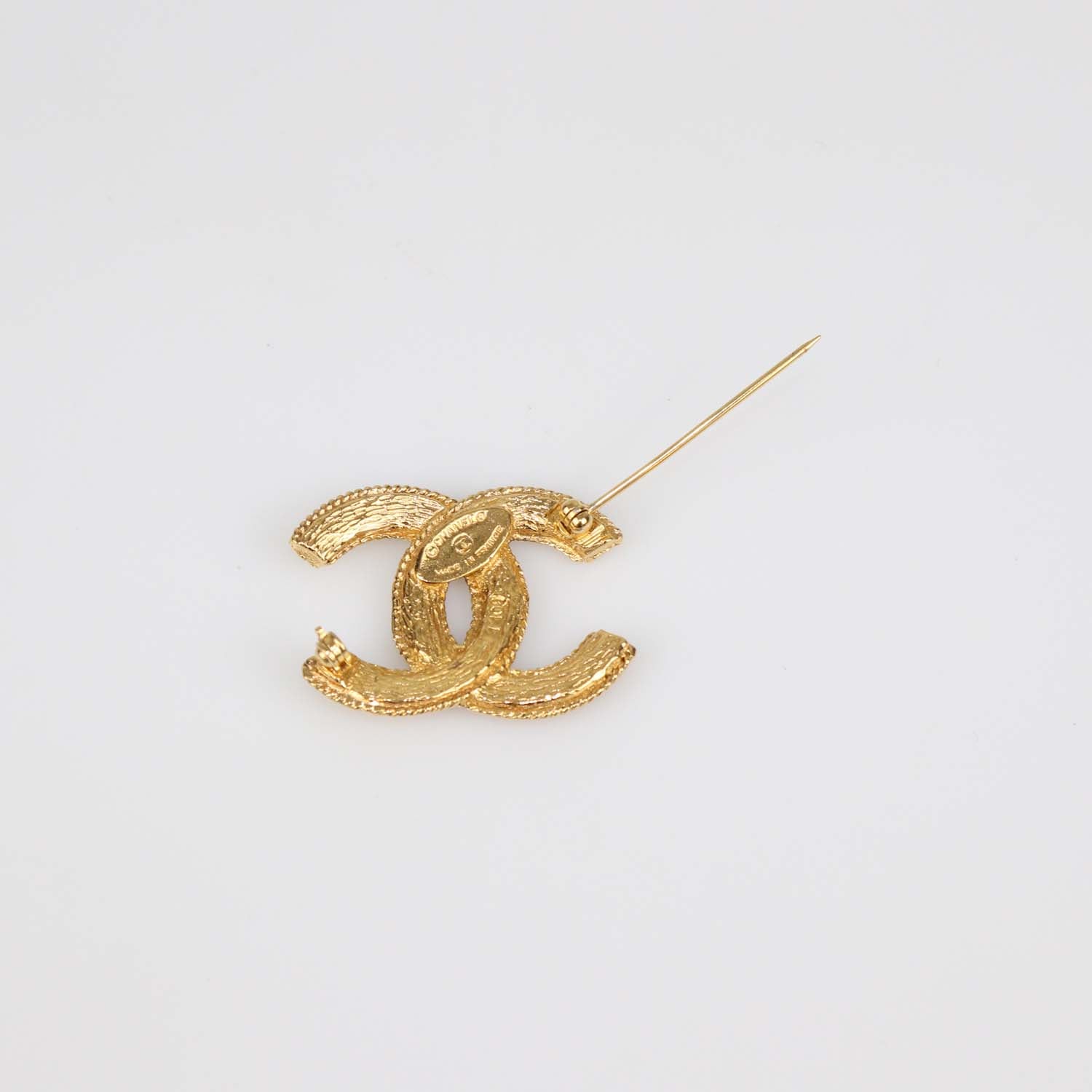 Chanel Gold Tone CC Brooch