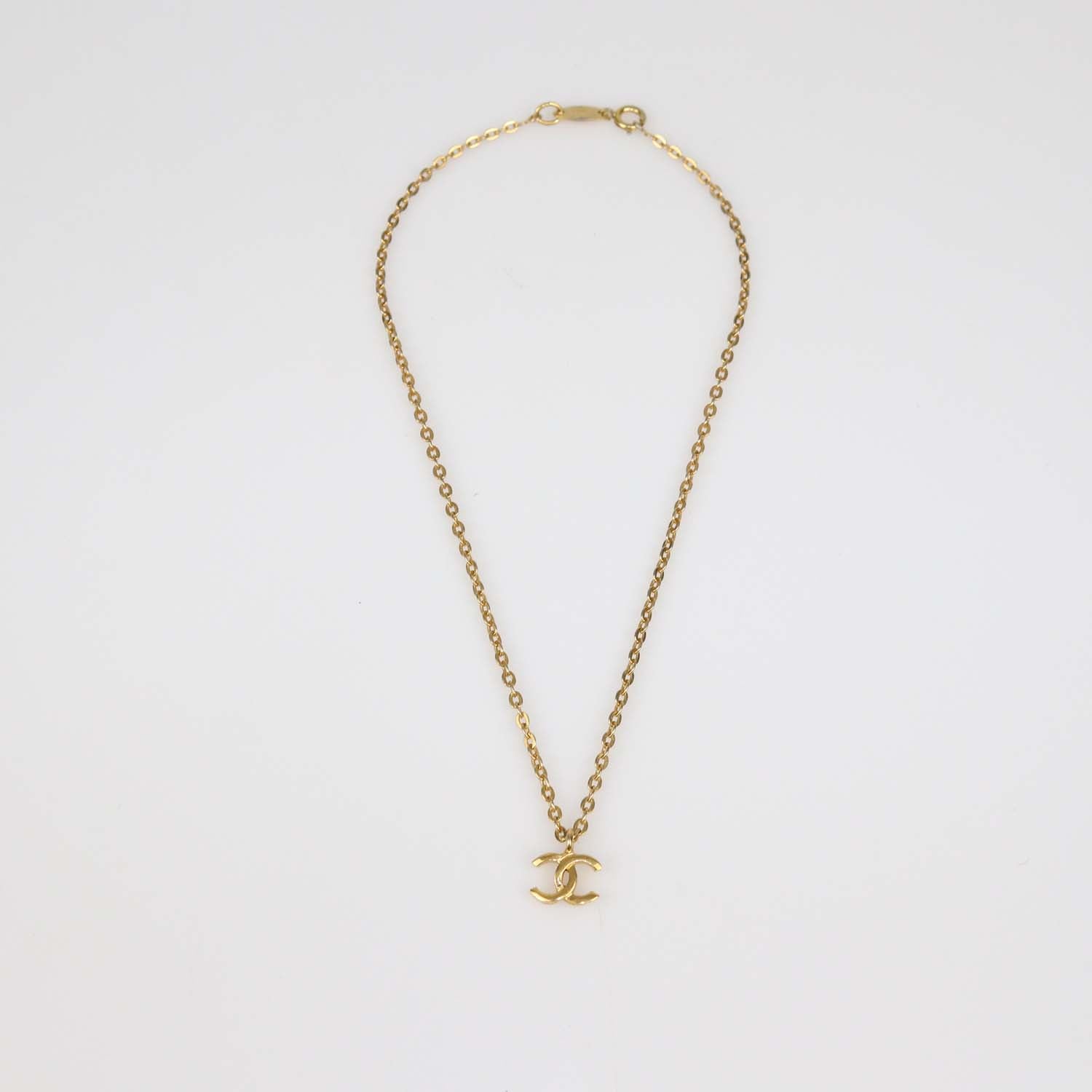 Chanel Gold Plated Metal CC Pendant Necklace