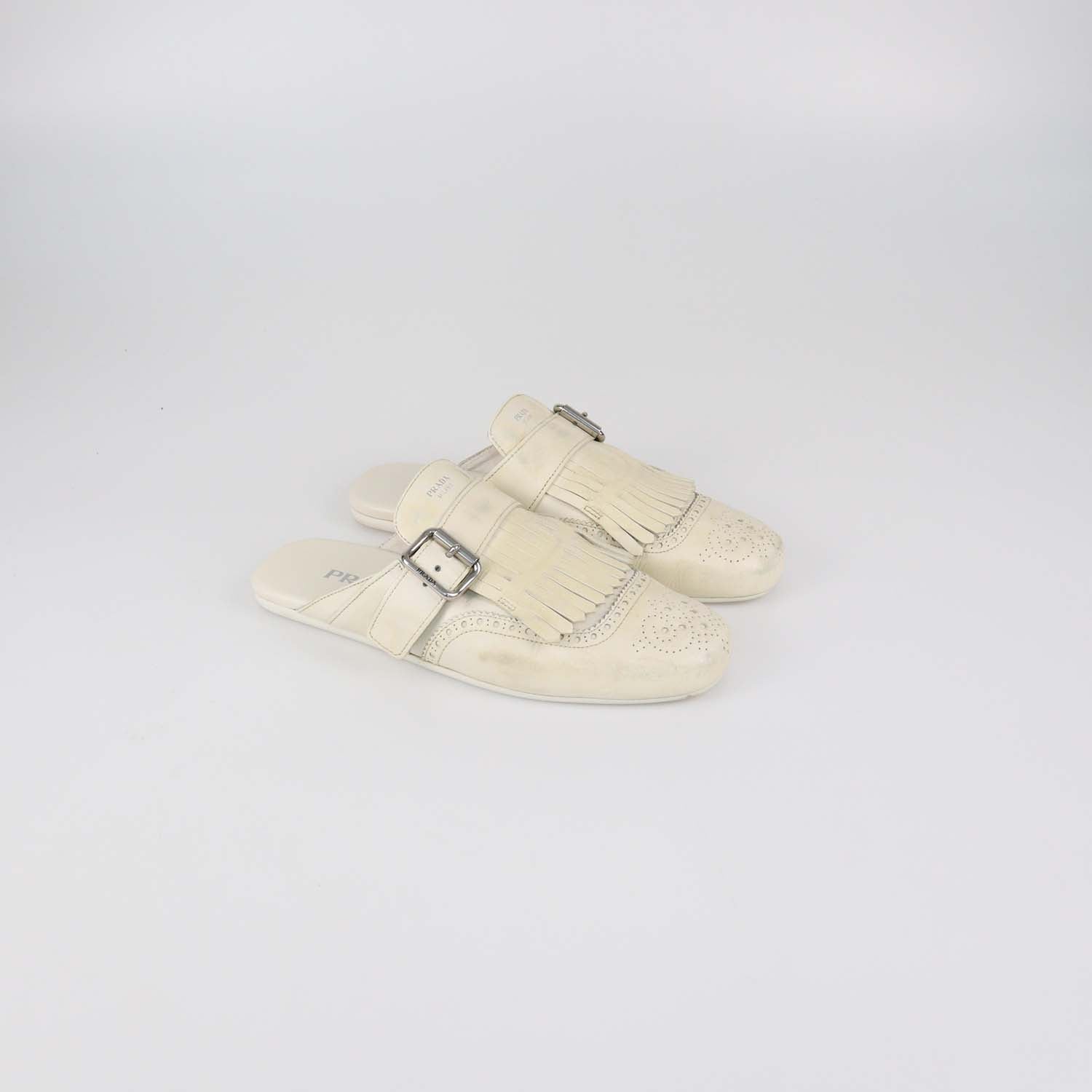 Prada Off White Leather Shuffle Fringed Mules