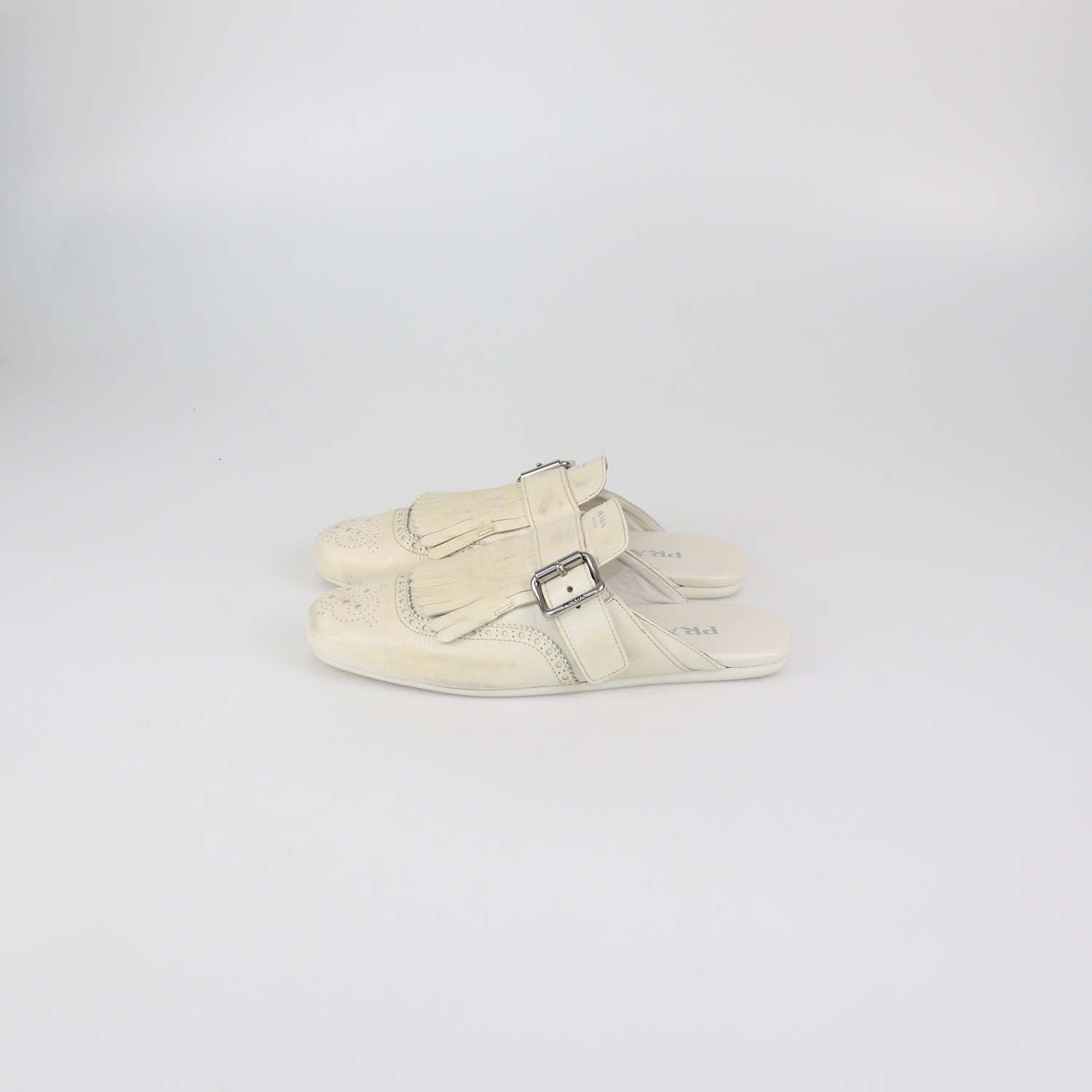 Prada Off White Leather Shuffle Fringed Mules