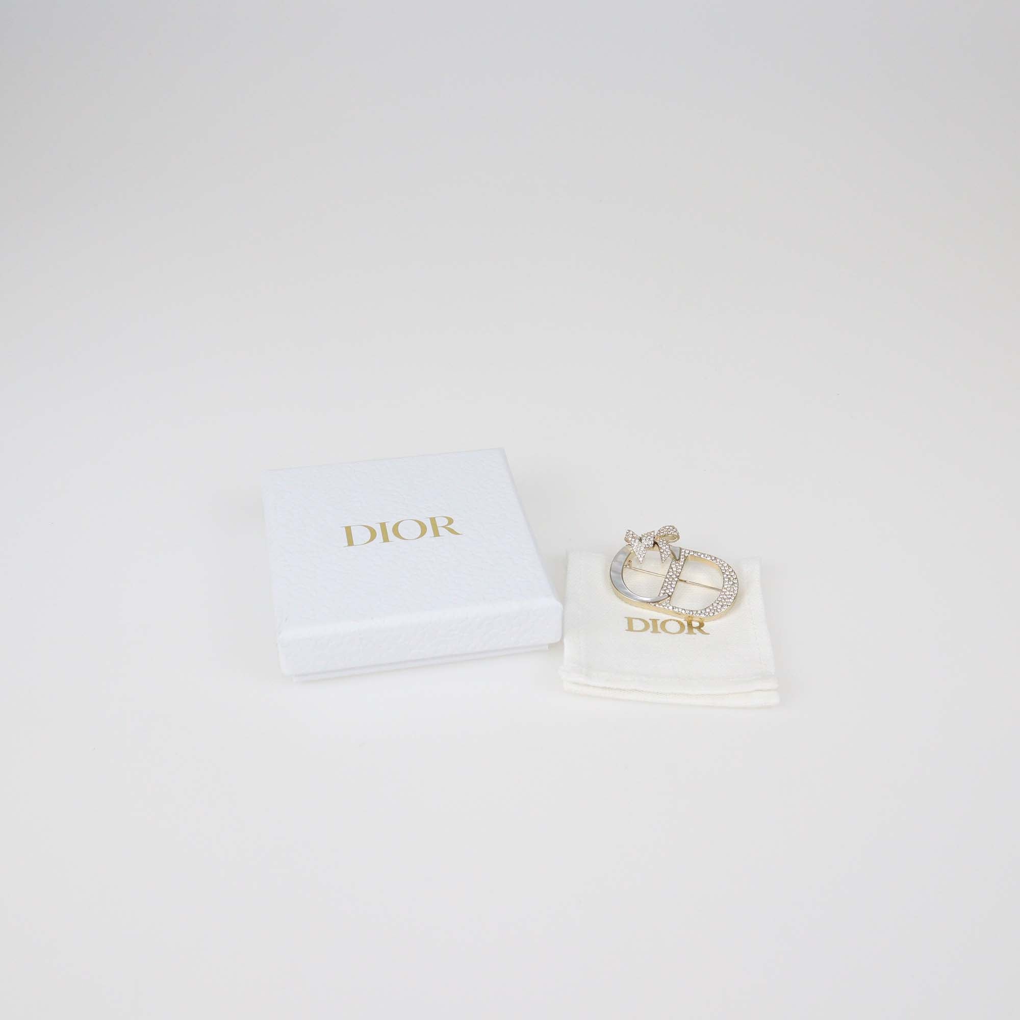 Christian Dior Gold Finish Metal Mother of Pearl Dior Shiny Bow Brooch