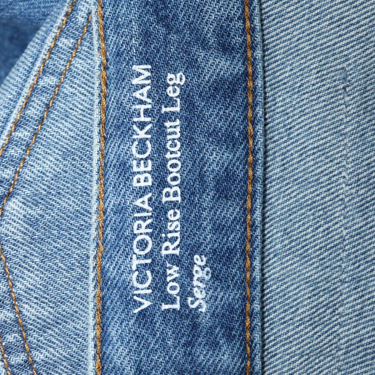 Victoria Beckham Washed Blue Denim Low Rise Bootcut Leg Pants
