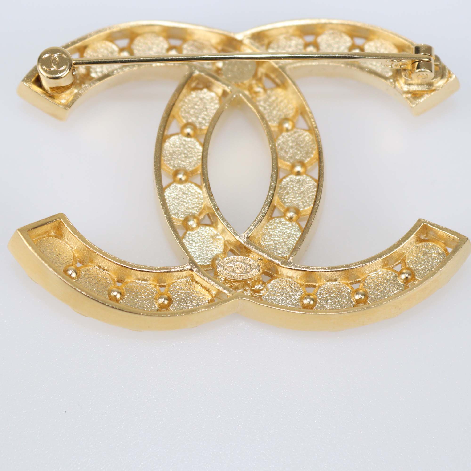 Chanel Gold Tone Metal CC Crystal Strass Pin Brooch