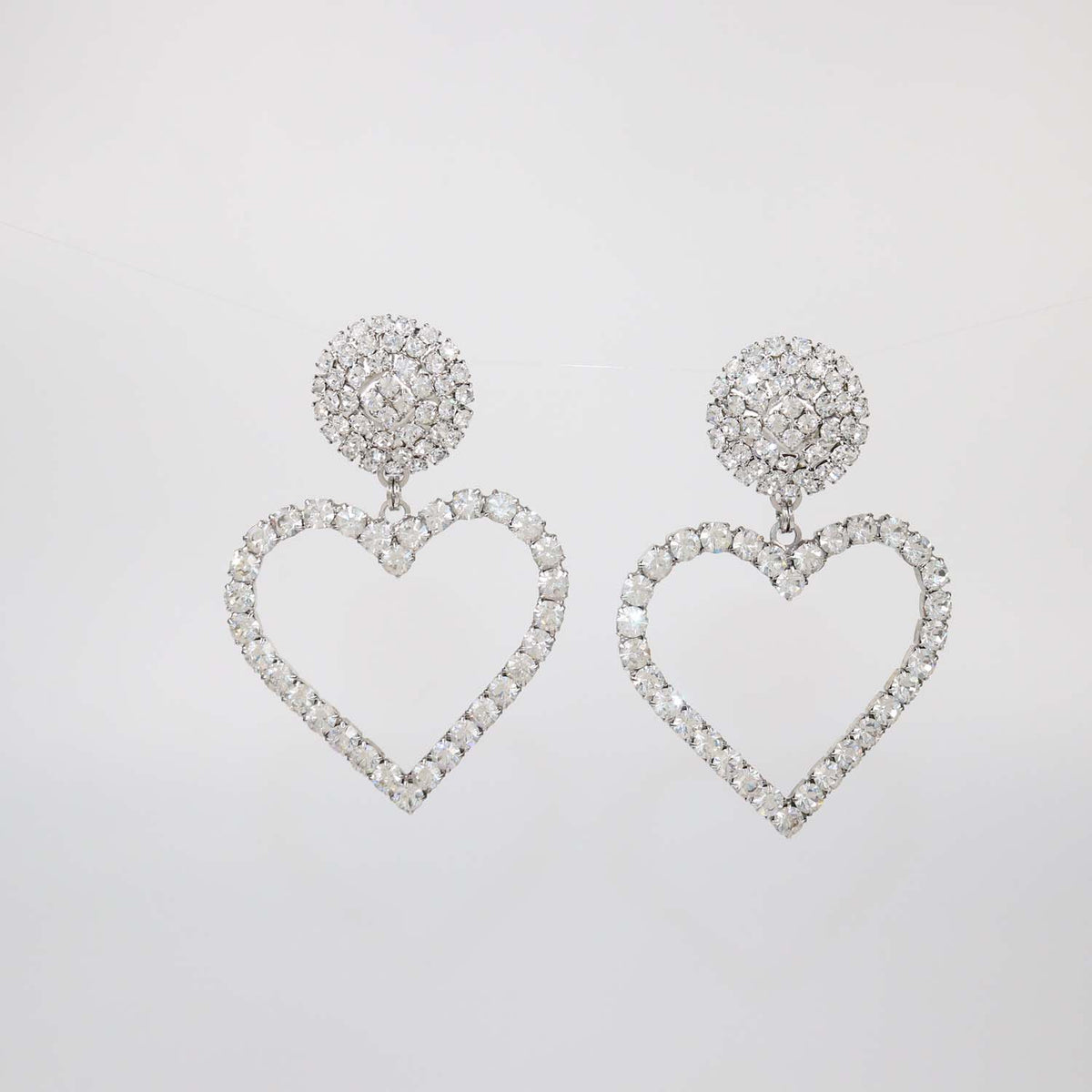 Alessandra Rich Silver Tone Crystal Heart Drop Clip Earrings