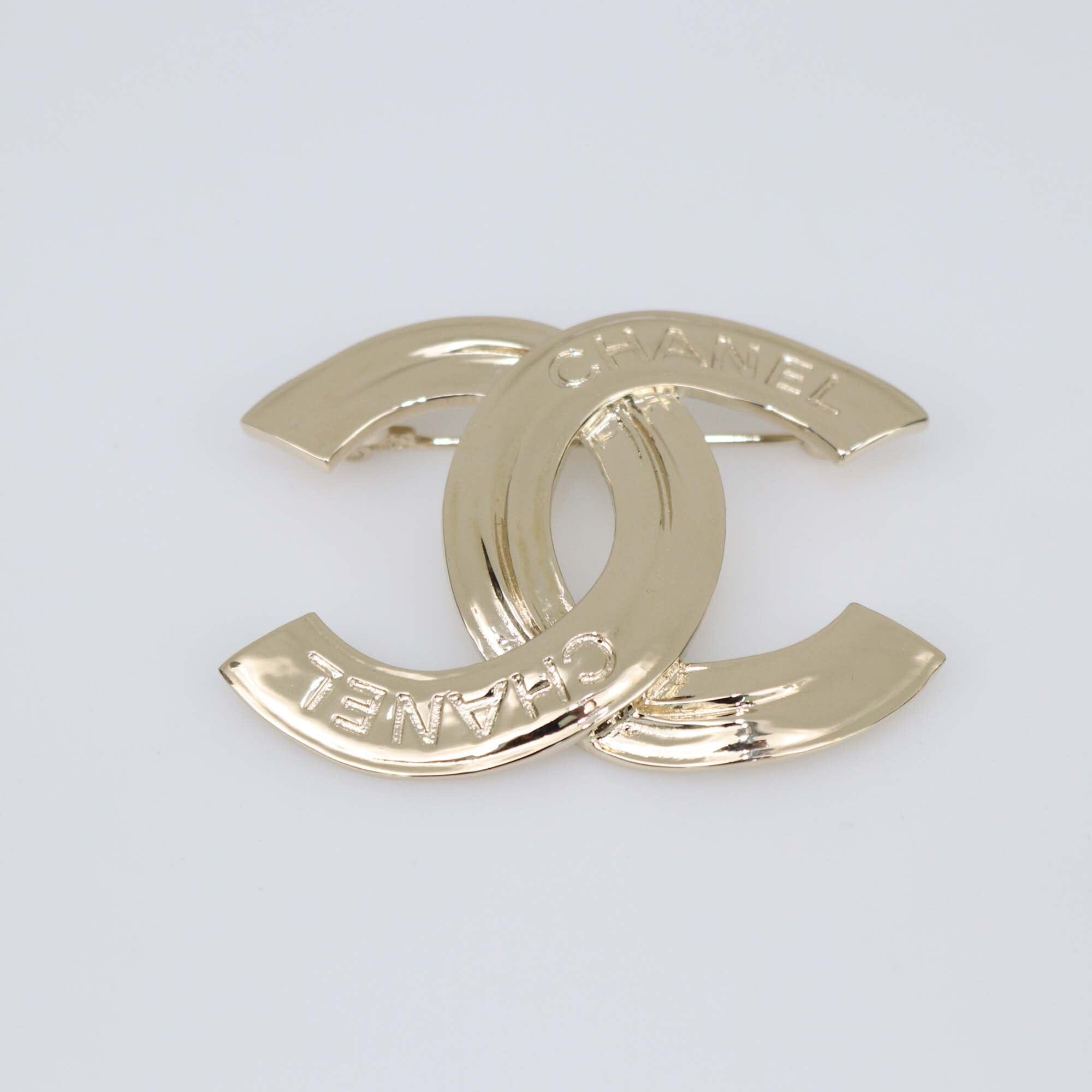 Chanel Gold Metal Tone CC Brooch Womens Chanel