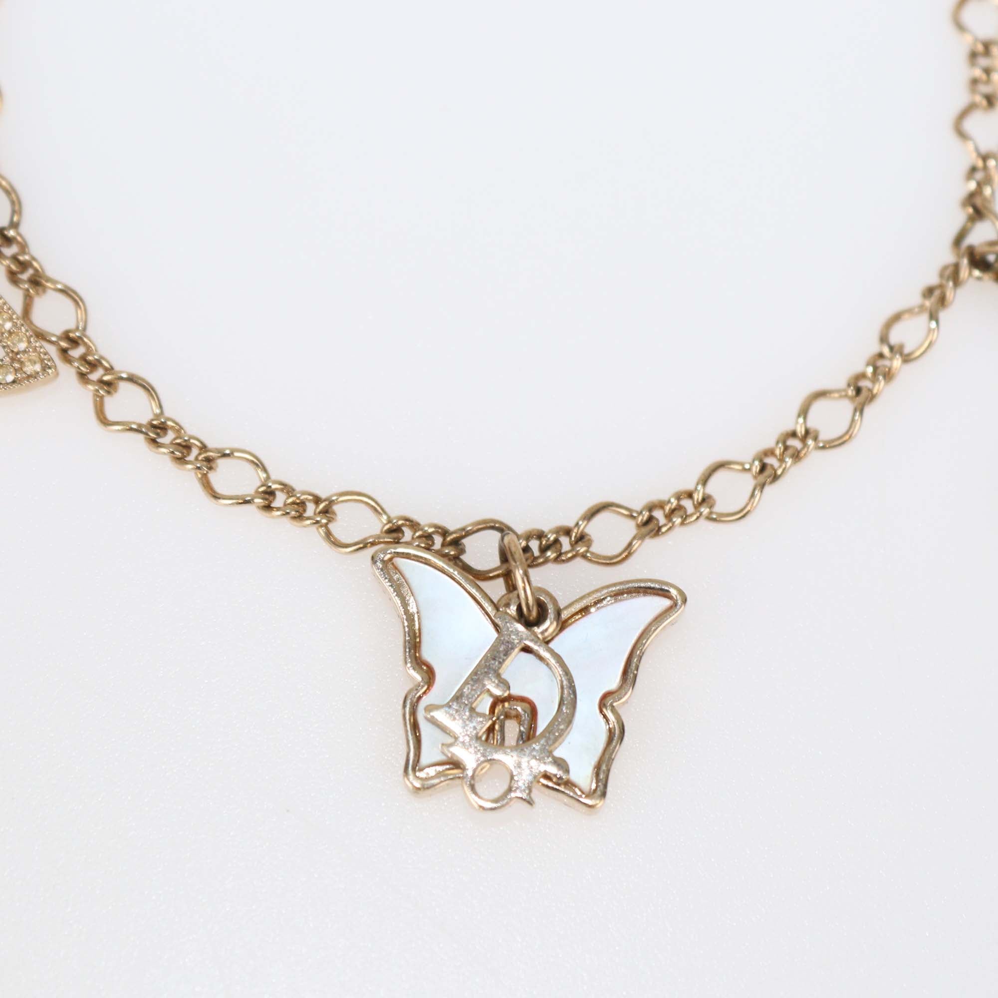 Dior Gold Tone Mother Of Pearl Butterfly Charm Bracelet