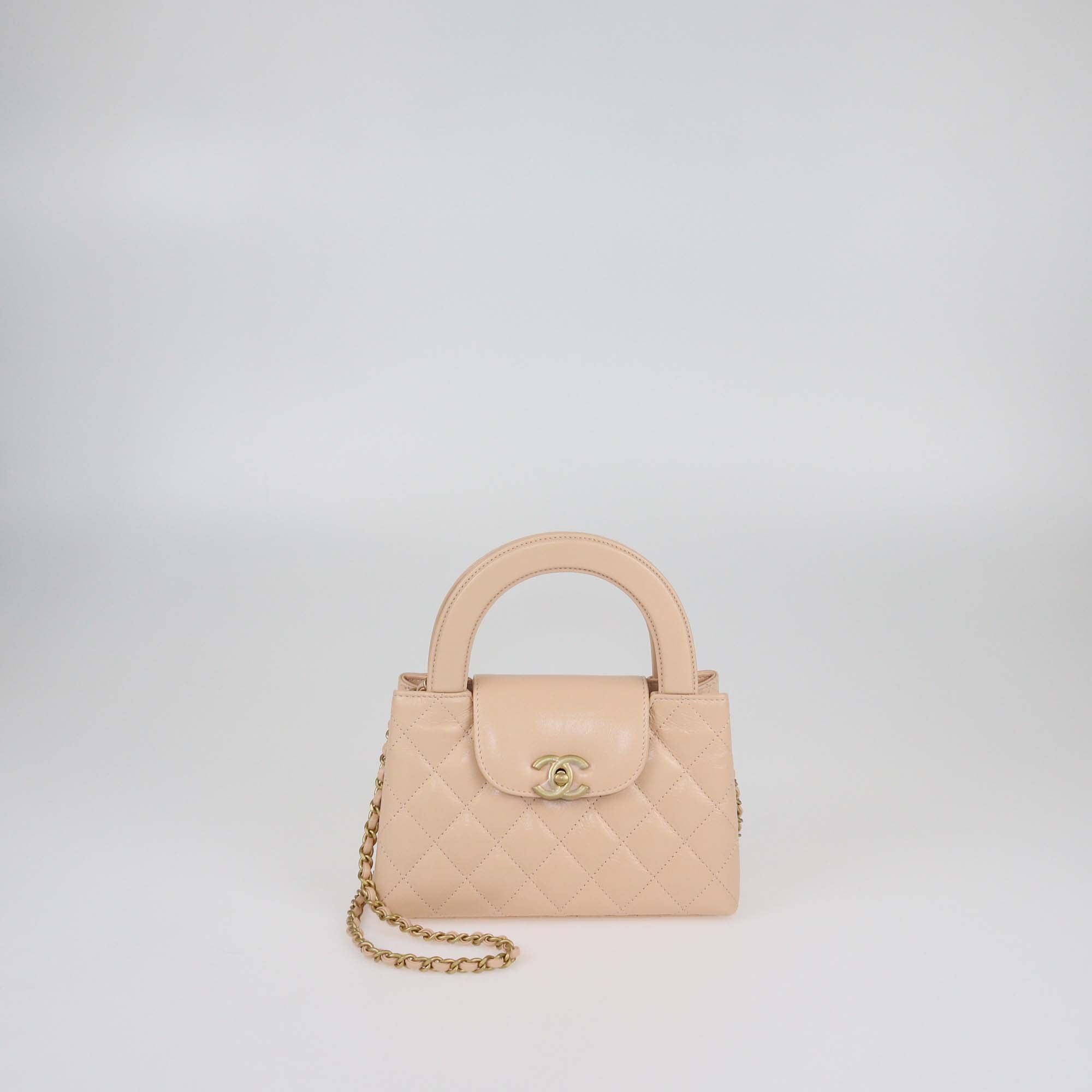 Chanel Blush Pink Quilted Leather Mini Kelly Top Handle Bag