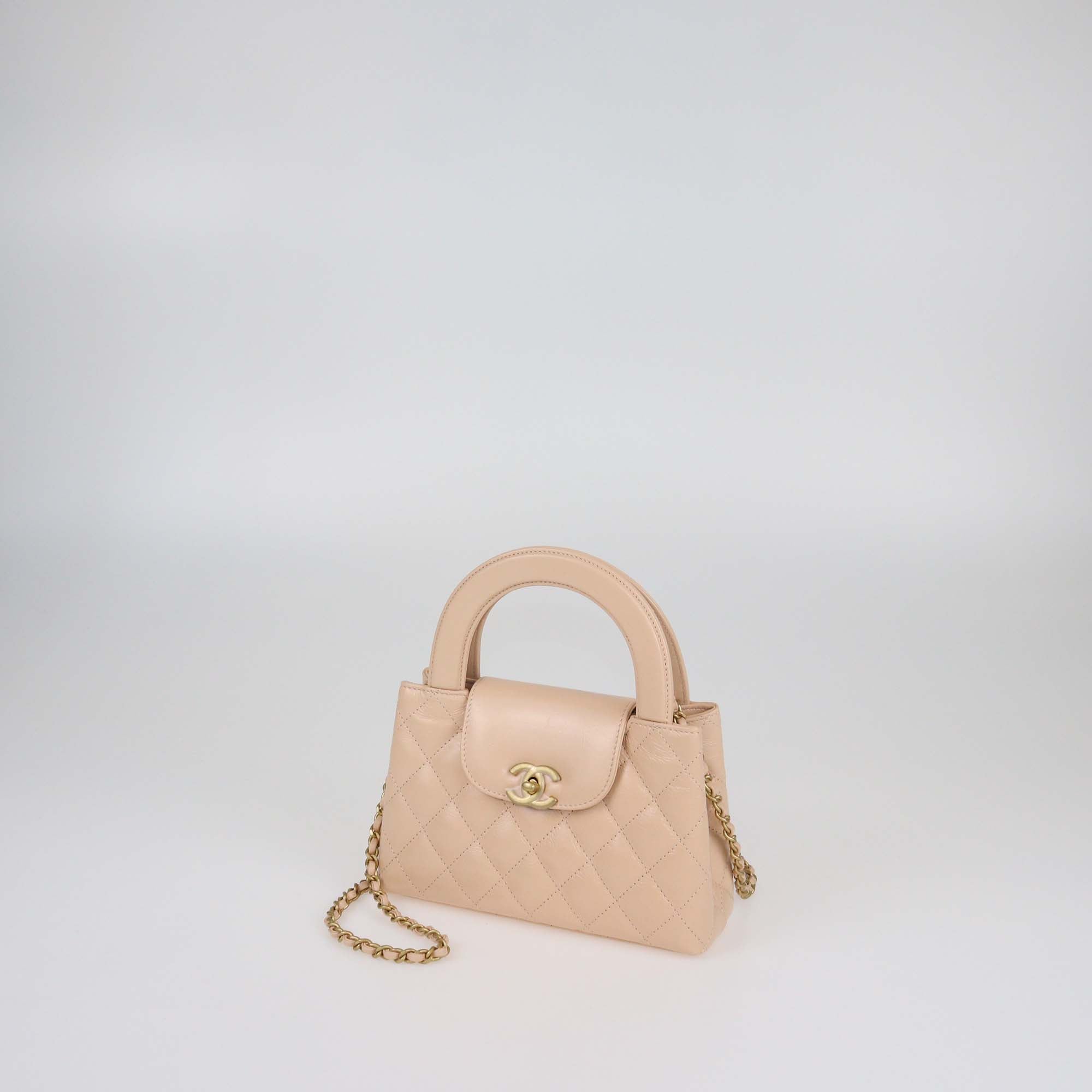 Chanel Blush Pink Quilted Leather Mini Kelly Top Handle Bag