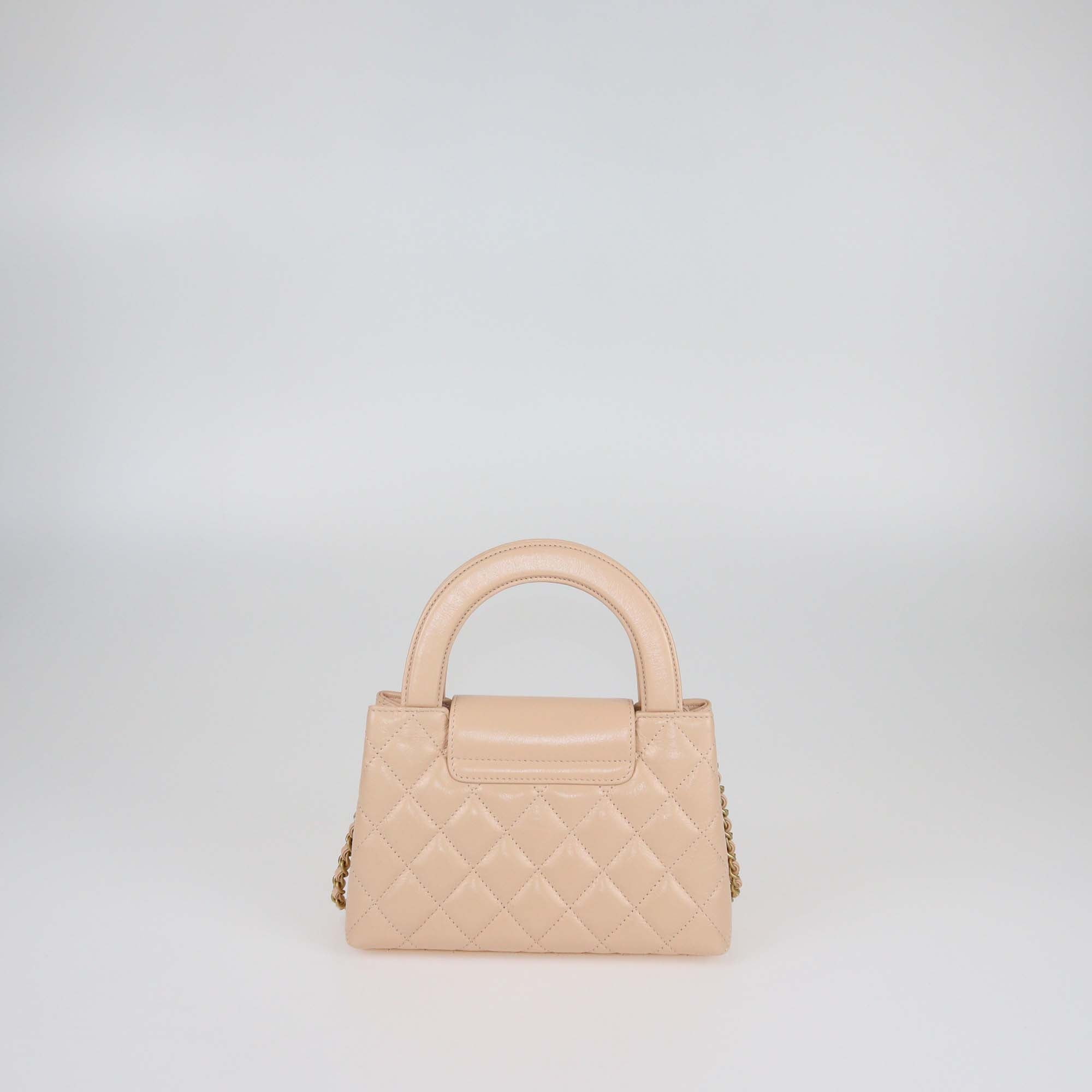 Chanel Blush Pink Quilted Leather Mini Kelly Top Handle Bag