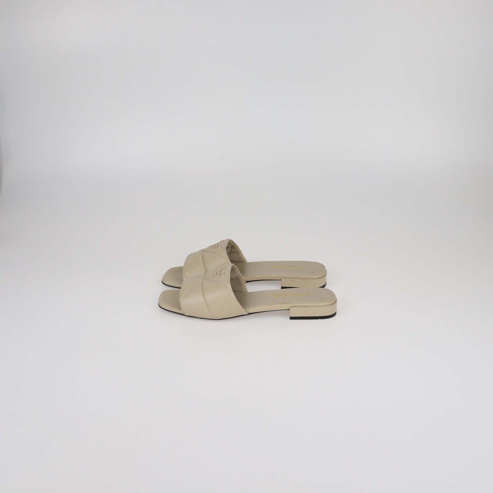 Prada Beige Quilted Leather Logo Slide Sandals