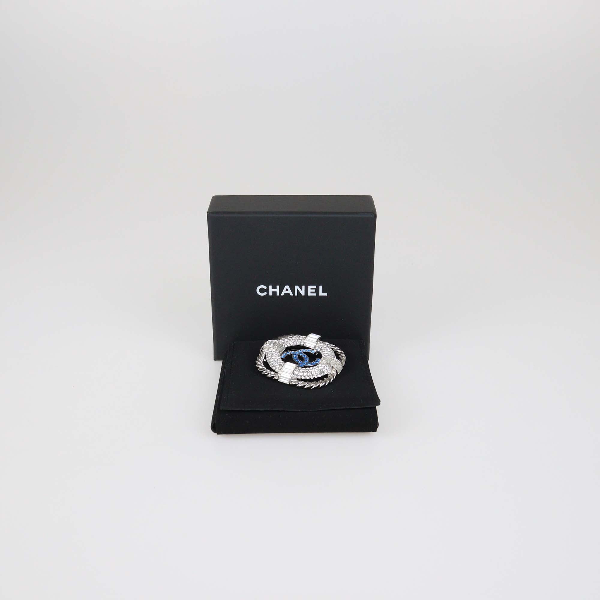 Chanel Silver Tone Metal/Blue Crystal CC Lifesaver Brooch