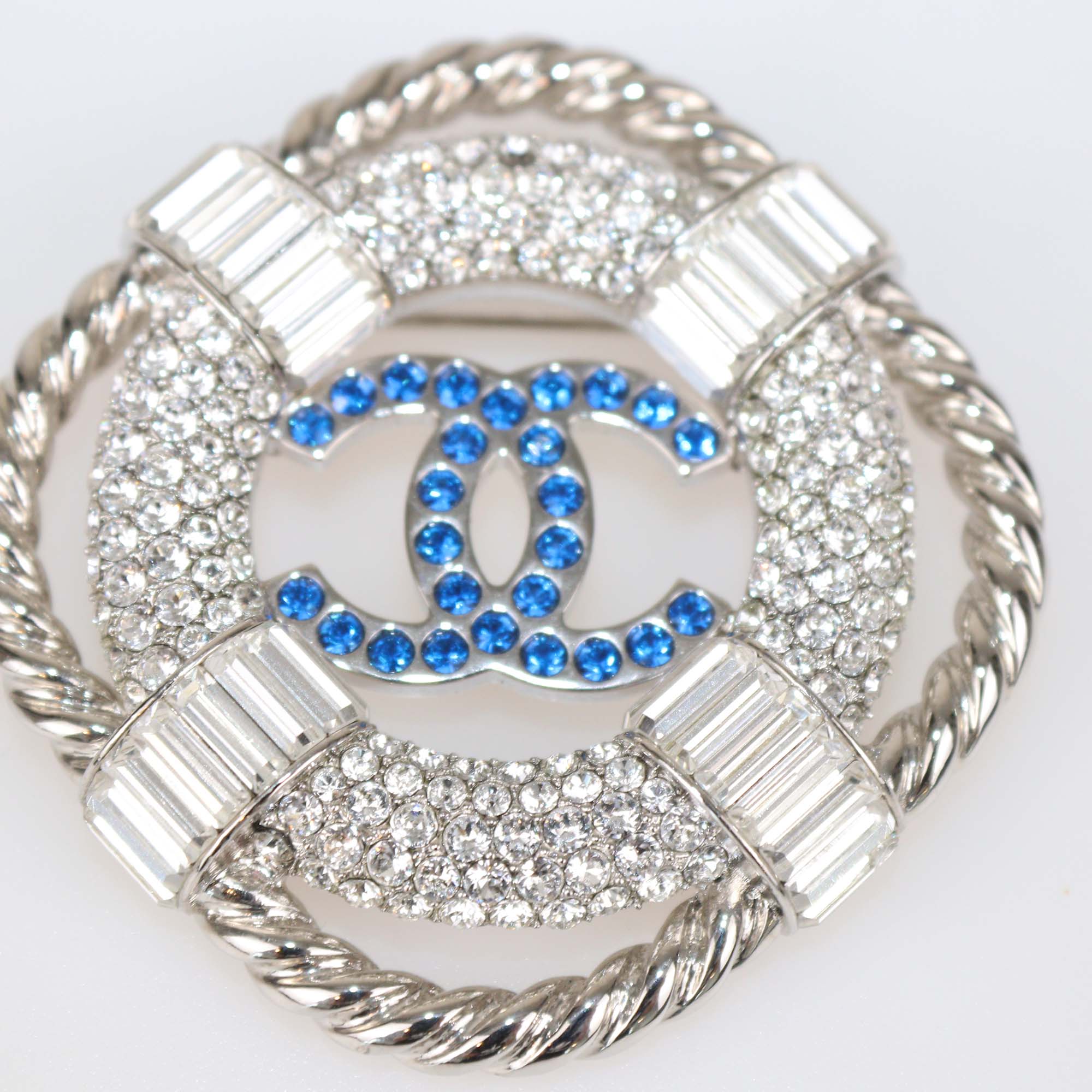 Chanel Silver Tone Metal/Blue Crystal CC Lifesaver Brooch