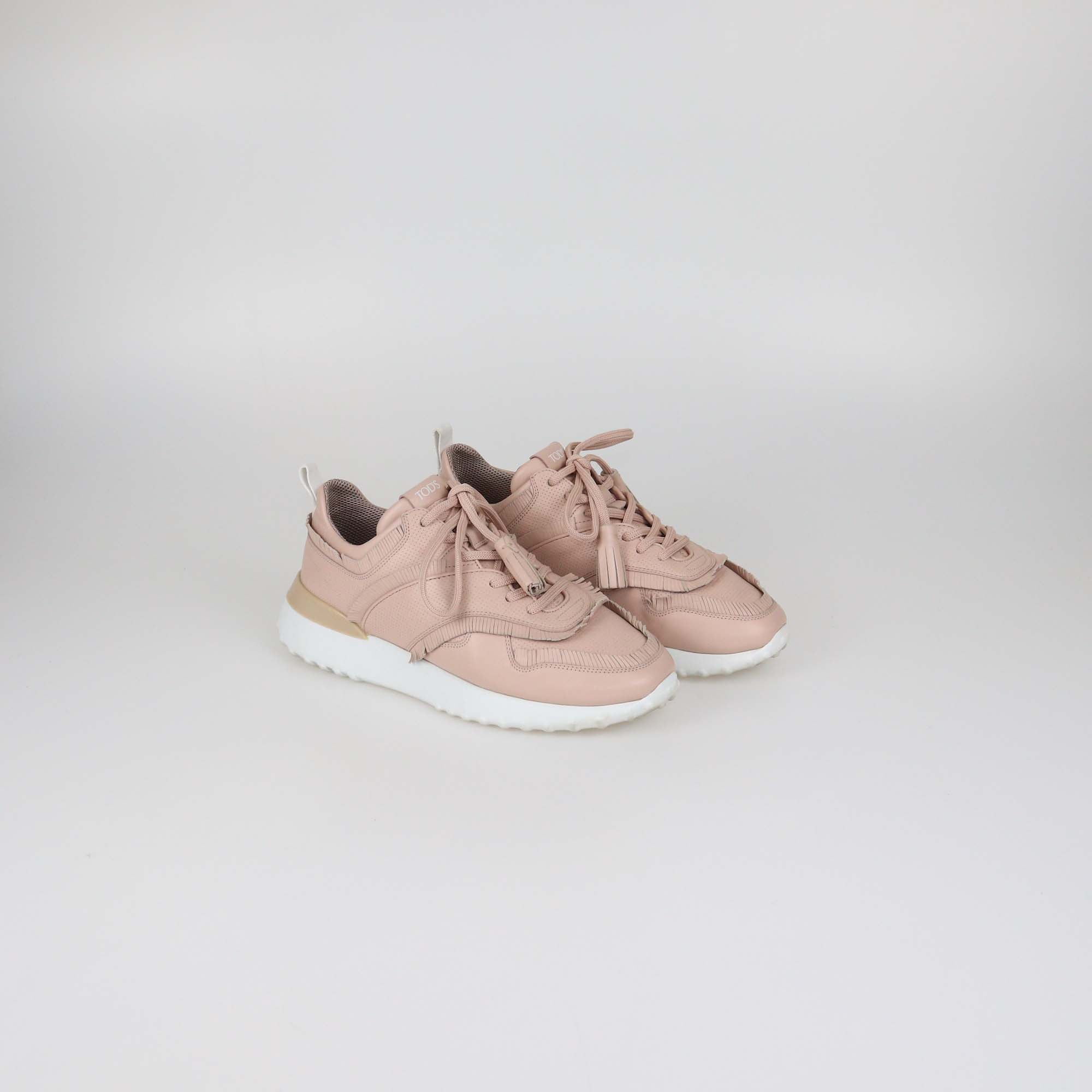 Tod's Pink Perforated Leather Fringed Tassel Low Top Sneakers