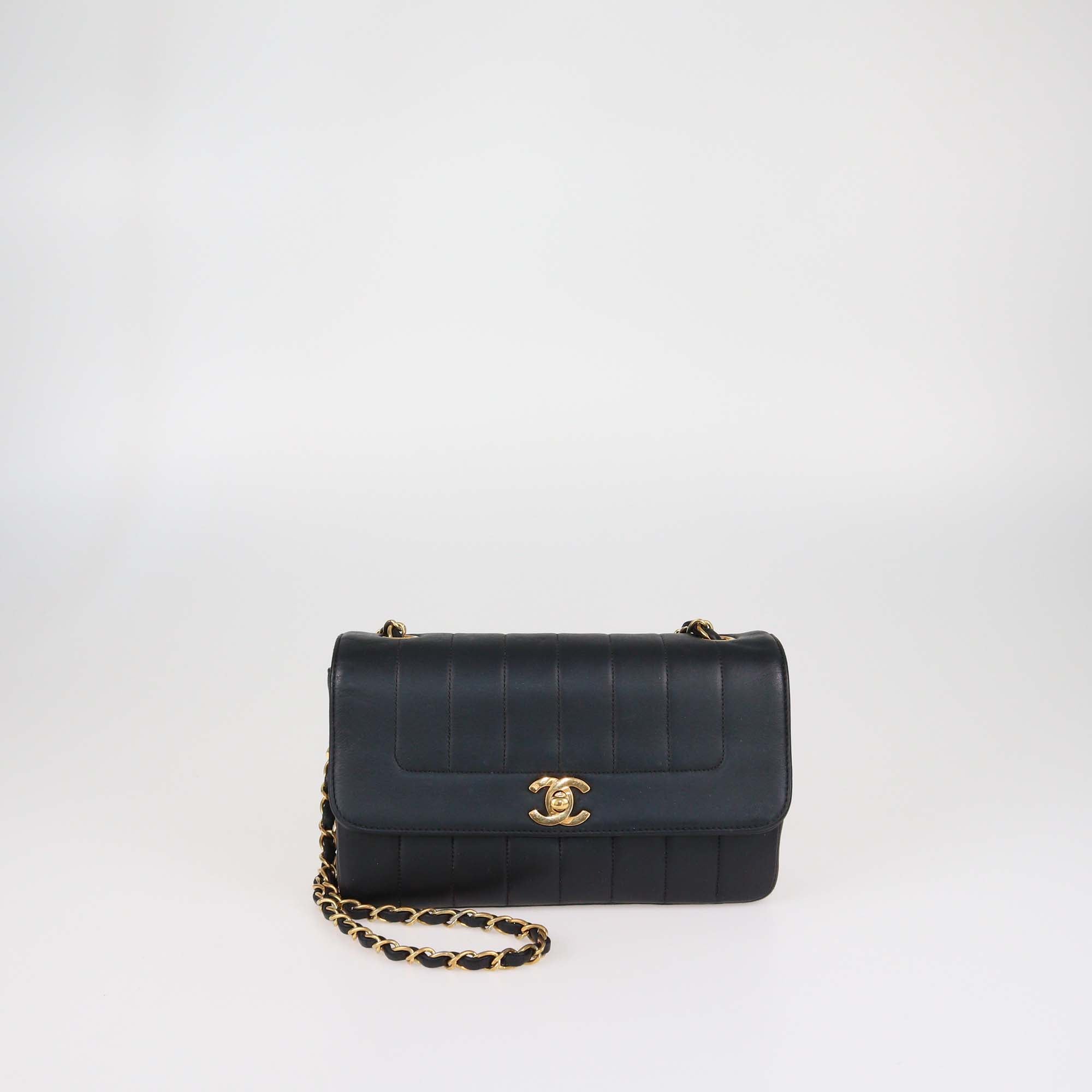 Chanel Black Vertical Quilt Leather Mademoiselle Flap Bag