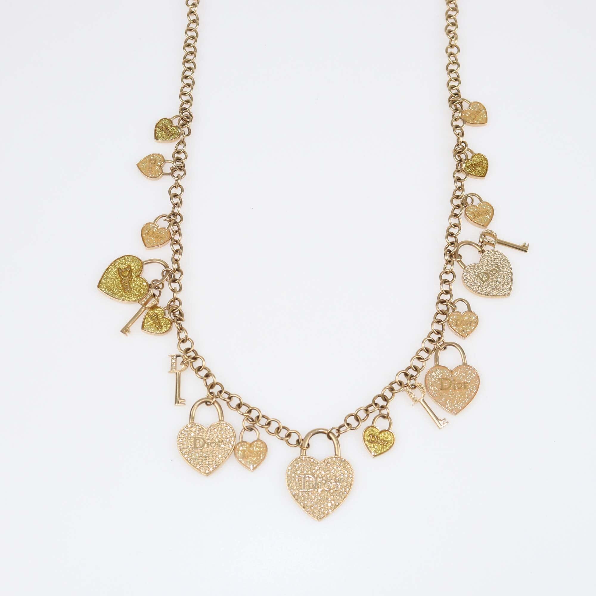 Christian Dior Gold Tone Crystal Heart and Key Multi Charms Long Necklace Womens Christian Dior 