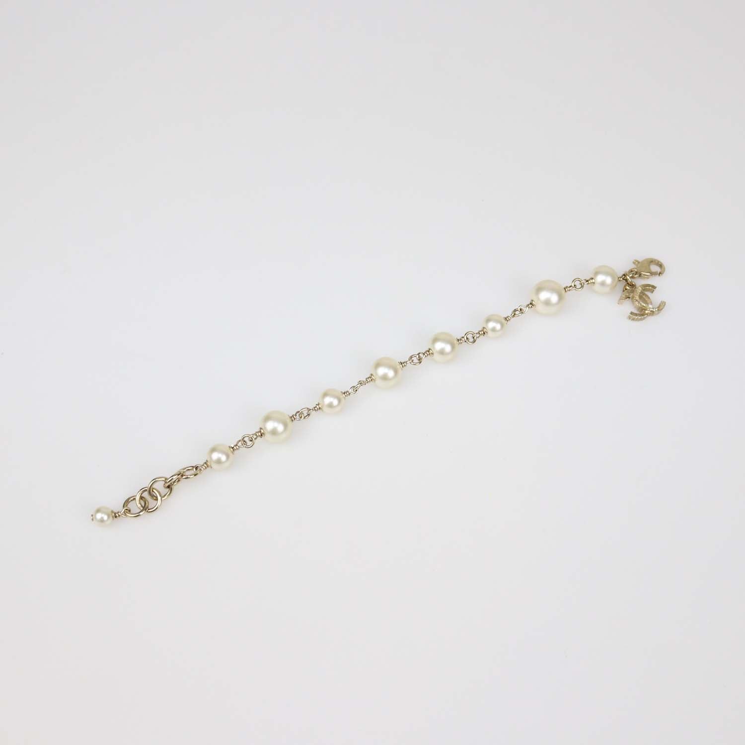 Chanel Gold Tone Faux Pearl CC Bracelet