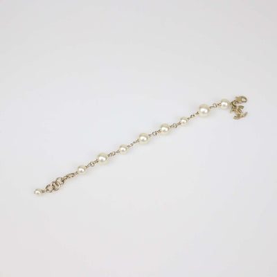 Chanel Gold Tone Faux Pearl CC Bracelet