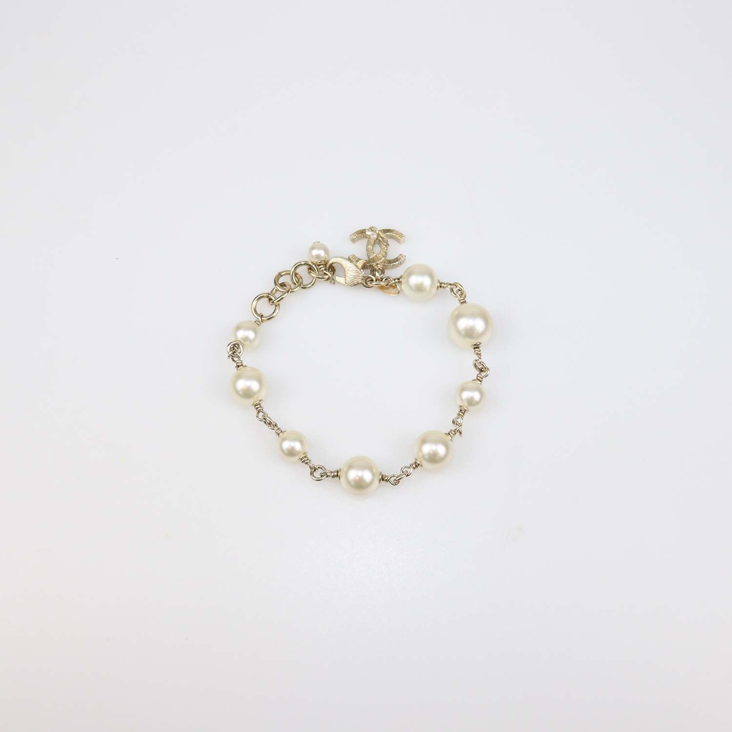 Chanel Gold Tone Faux Pearl CC Bracelet