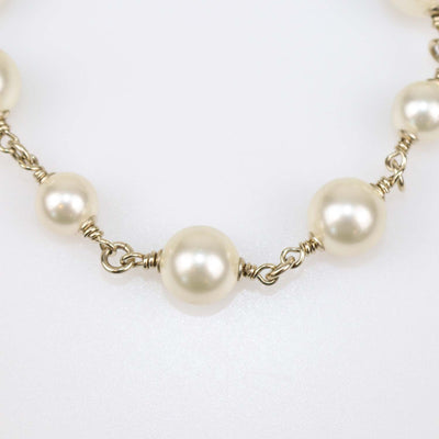 Chanel Gold Tone Faux Pearl CC Bracelet