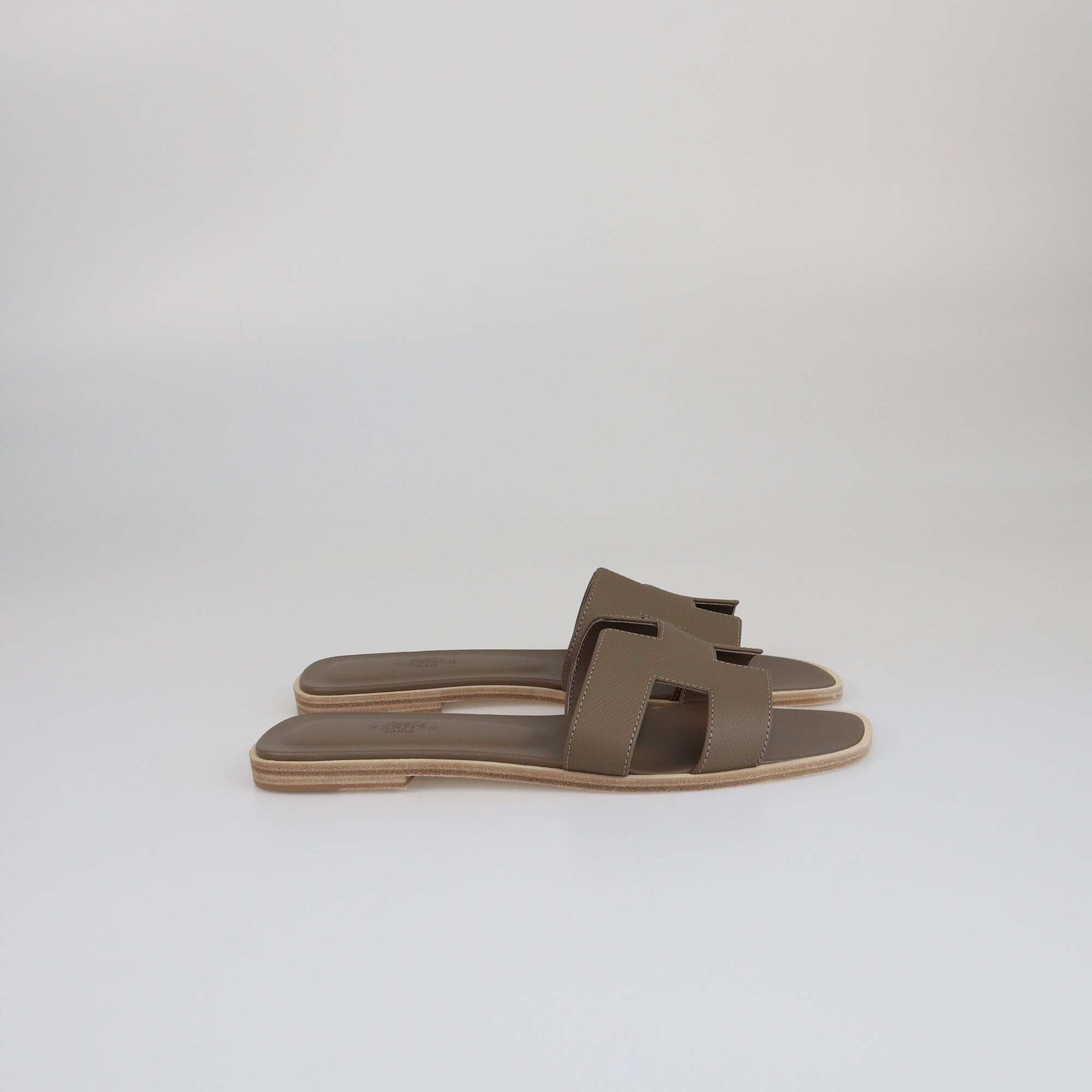 Hermes Etoupe Grey Oran Flat Sandals Womens Hermes 