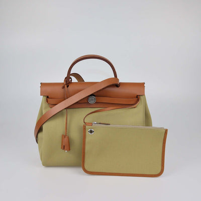 Hermes Poussiere, Fauve Canvas and Leather Herbag Zip Retourne 31 bag