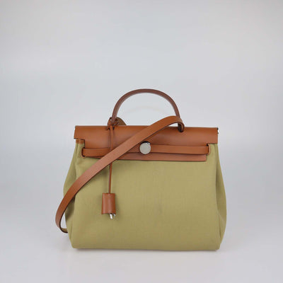 Hermes Poussiere, Fauve Canvas and Leather Herbag Zip Retourne 31 bag