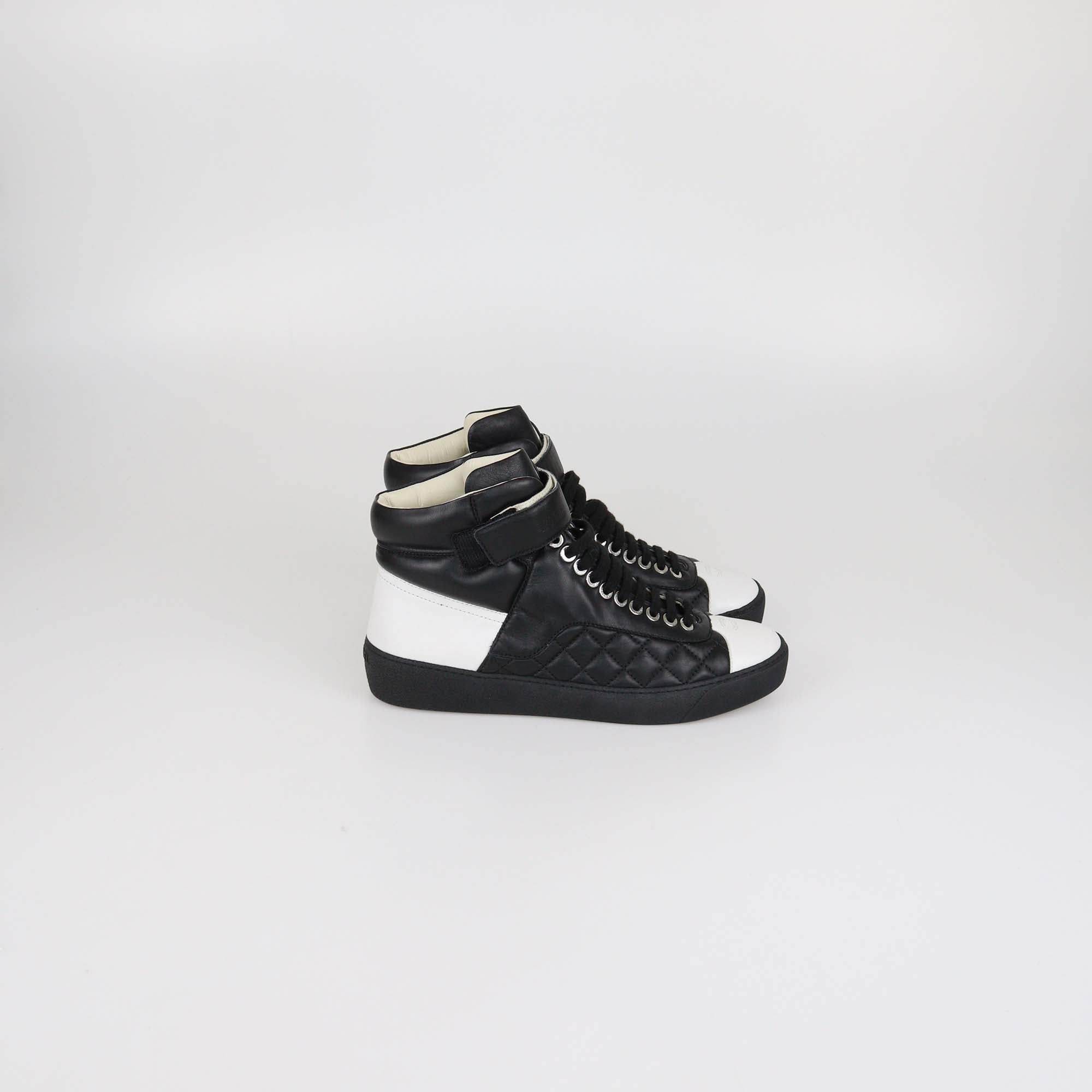 Chanel Black/White Quilted Leather CC High Top Sneakers