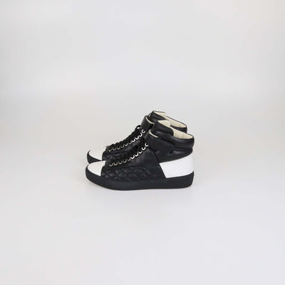 Chanel Black/White Quilted Leather CC High Top Sneakers
