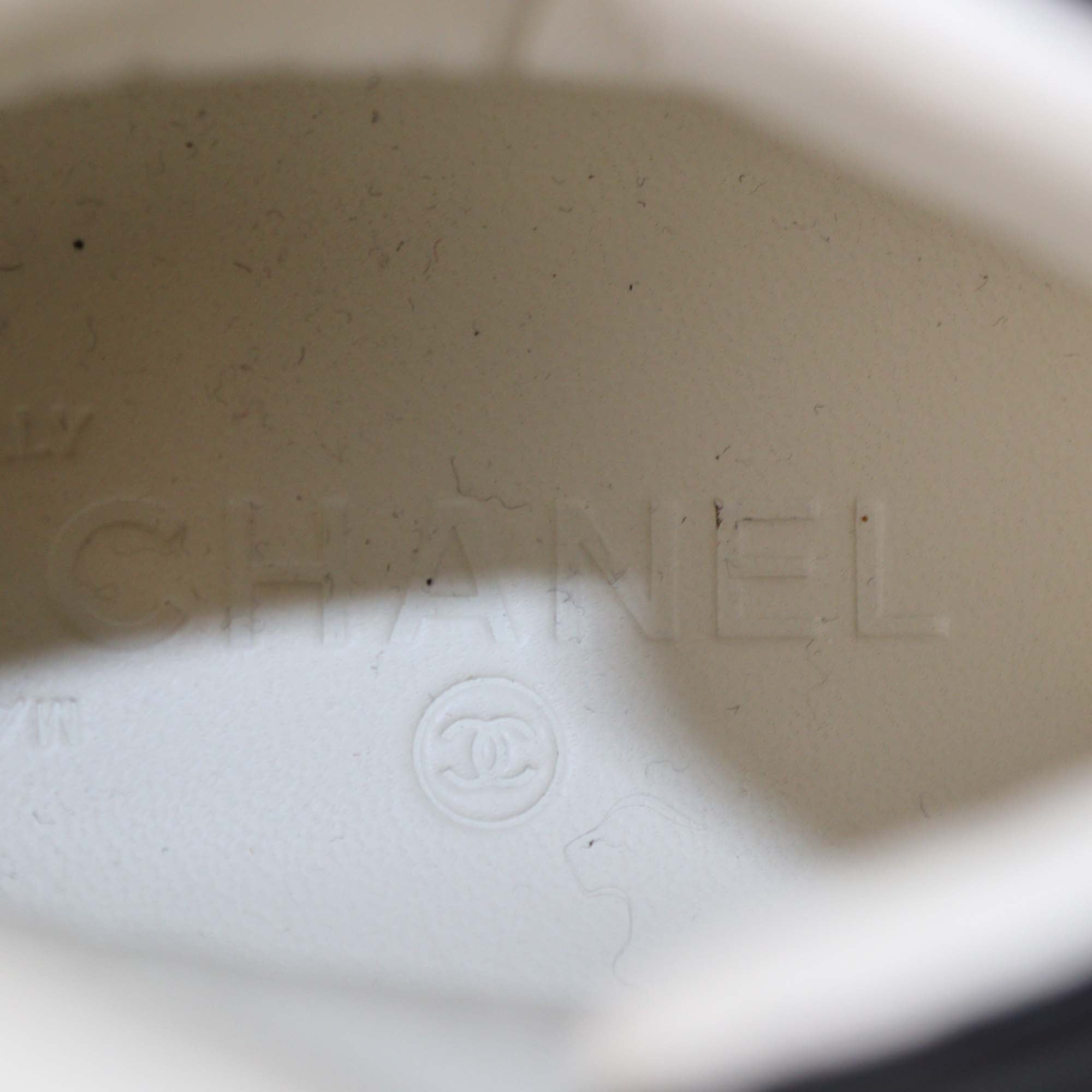 Chanel Black/White Quilted Leather CC High Top Sneakers