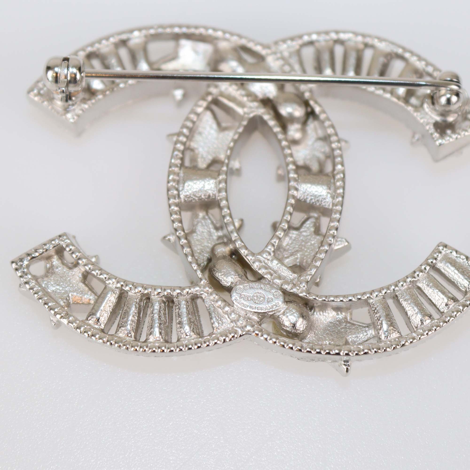 Chanel Silver Tone Metal Crystal Star and Faux Pearl CC Brooch