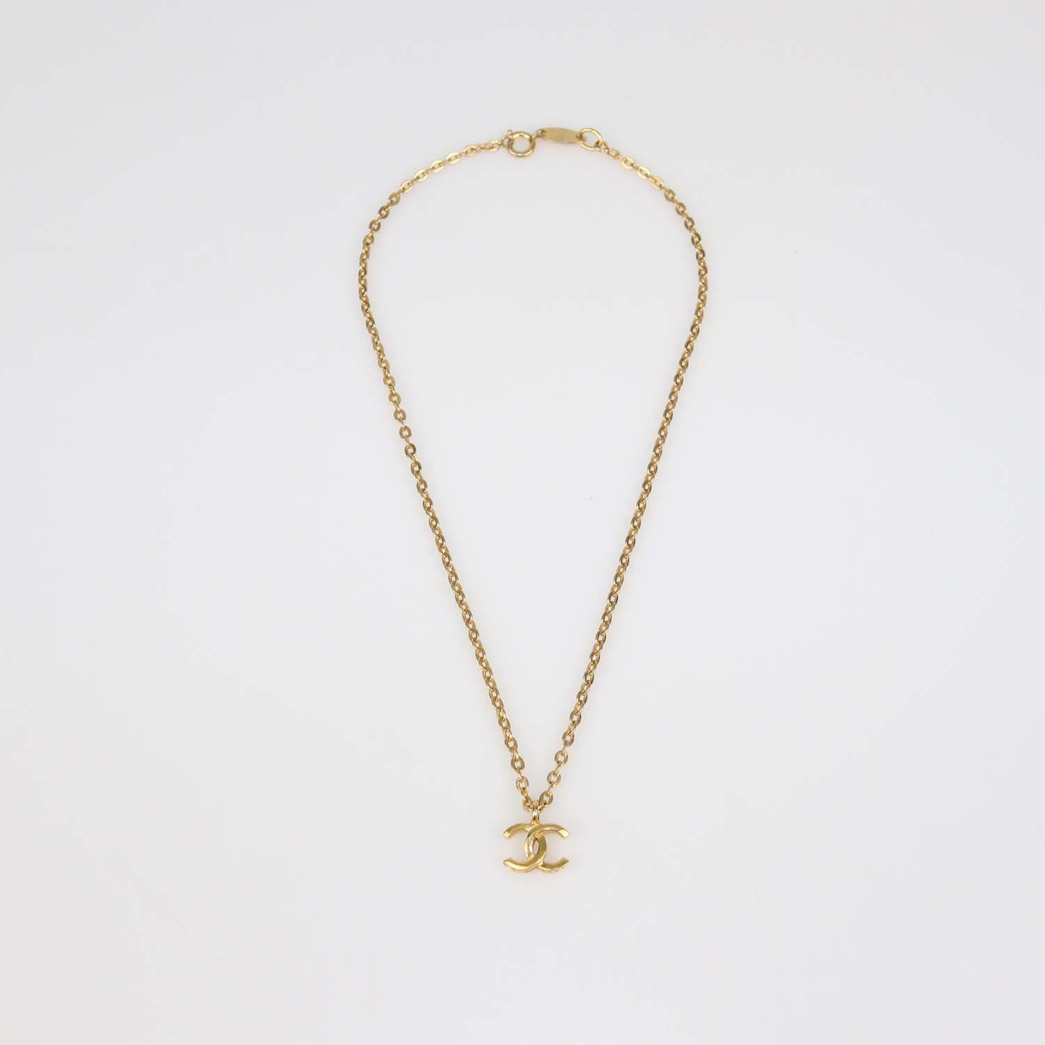 Chanel Gold Plated Metal CC Pendant Necklace