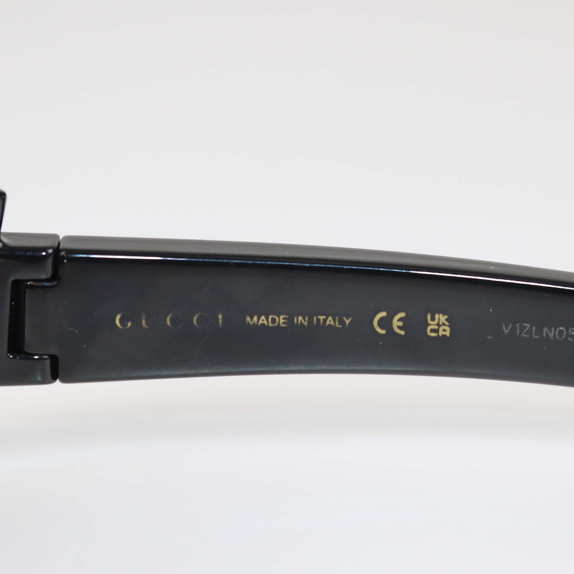 Gucci Black Irregular Injected Frame Shield Sunglasses