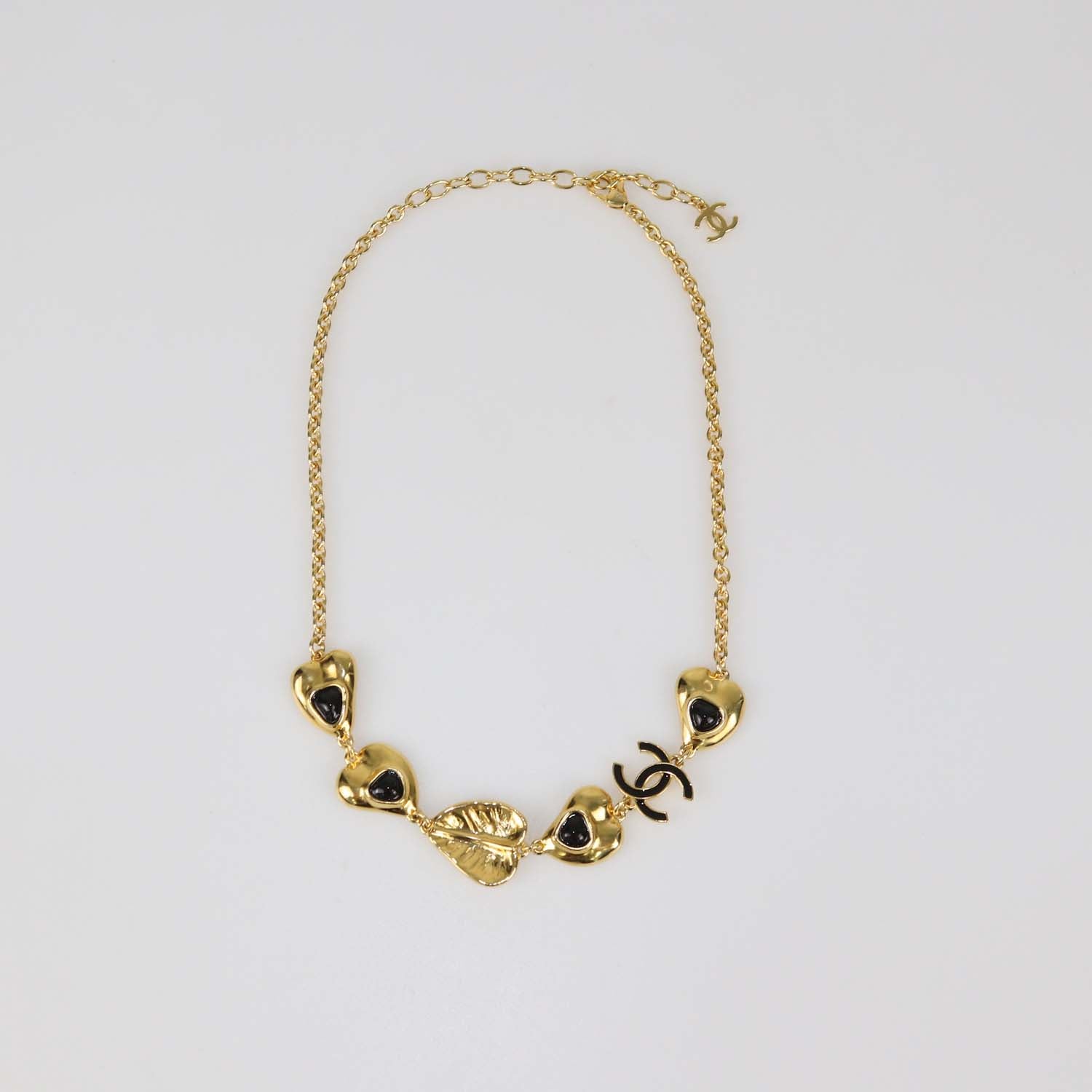 Chanel Gold Tone Metal Black Resin Hearts CC Logo Necklace