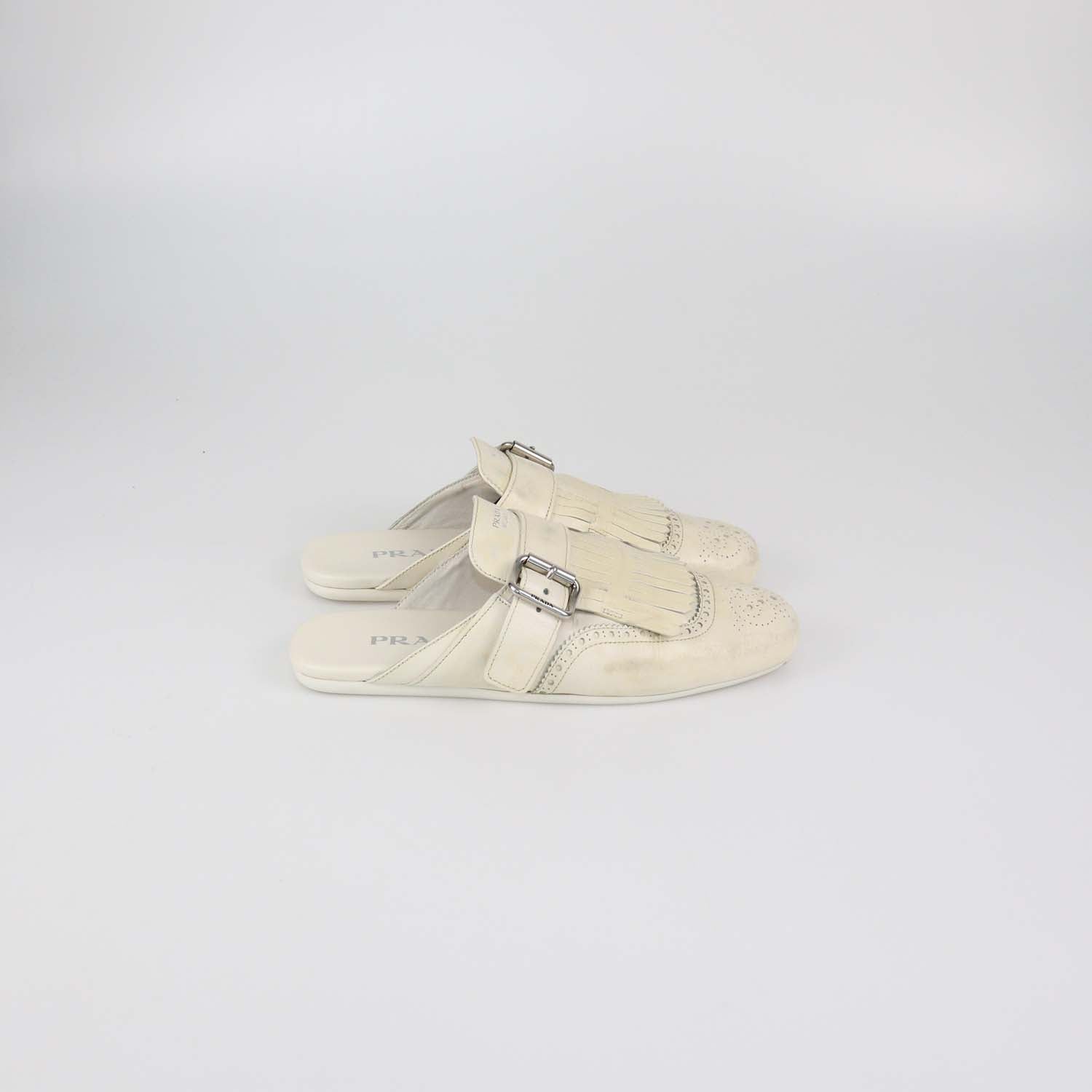 Prada Off White Leather Shuffle Fringed Mules