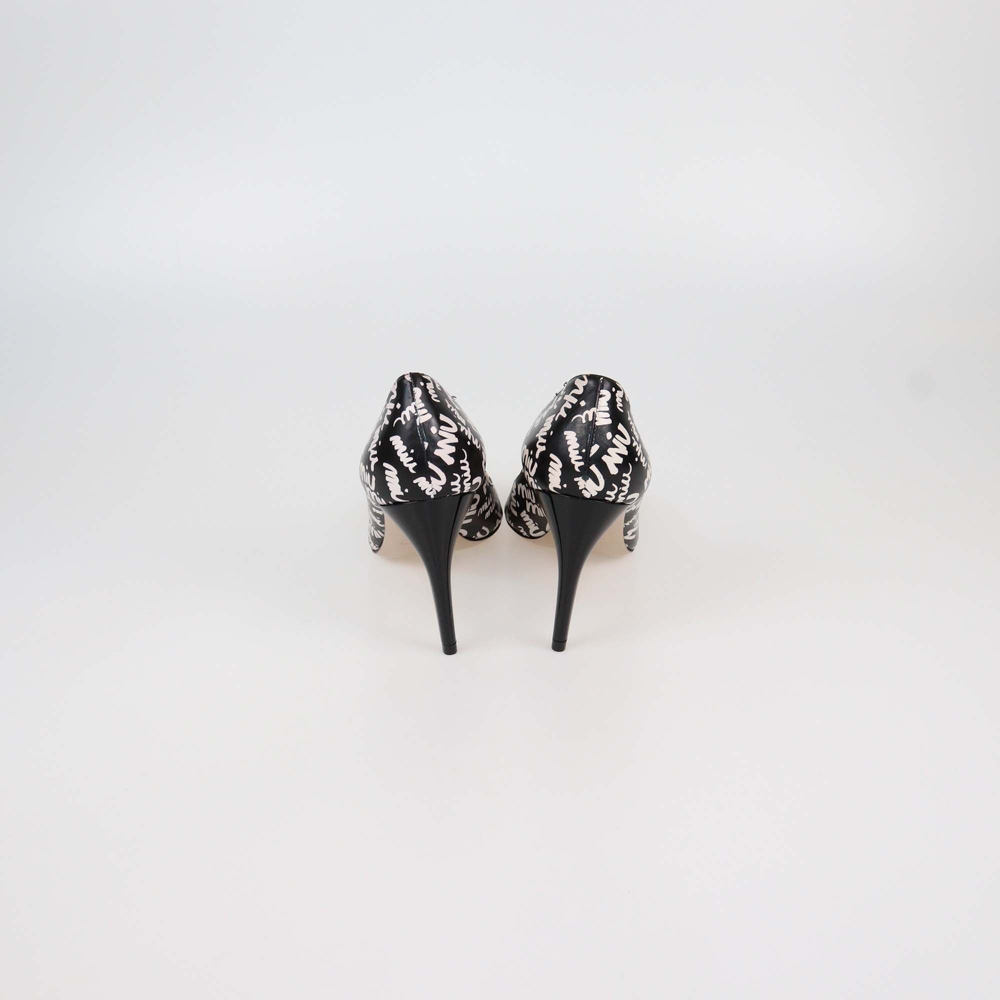 Miu Miu Black/White Leather Logo Print Pointed Toe Pumps